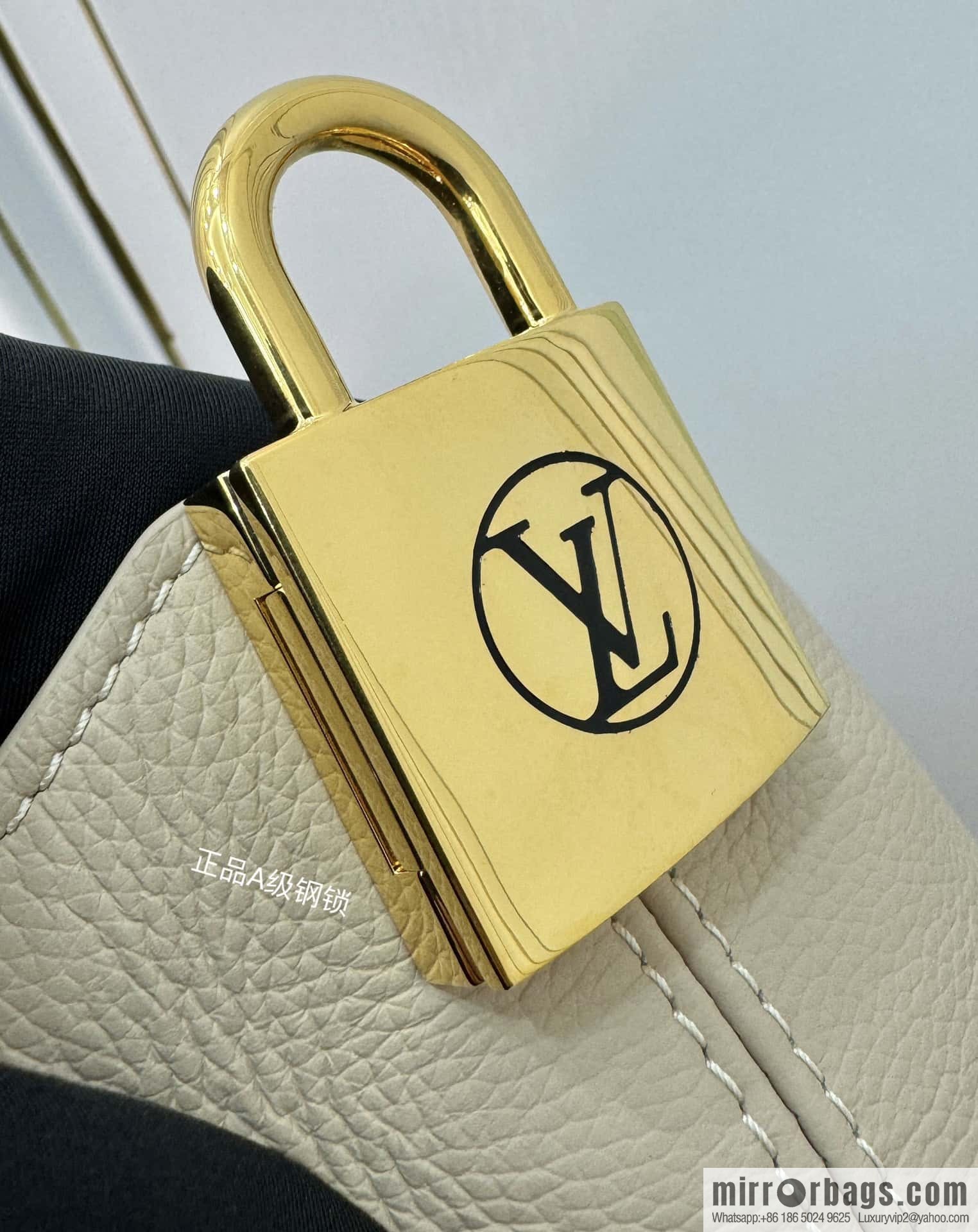 LV M25022 LOW KEY HOBO medium handbag