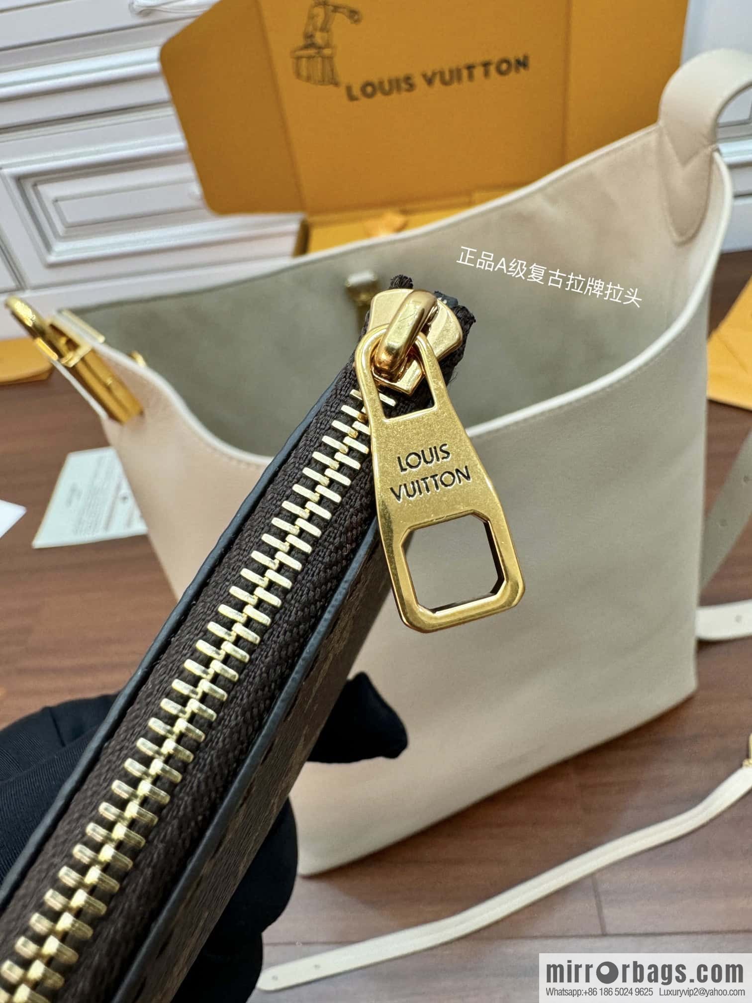 LV M25022 LOW KEY HOBO medium handbag