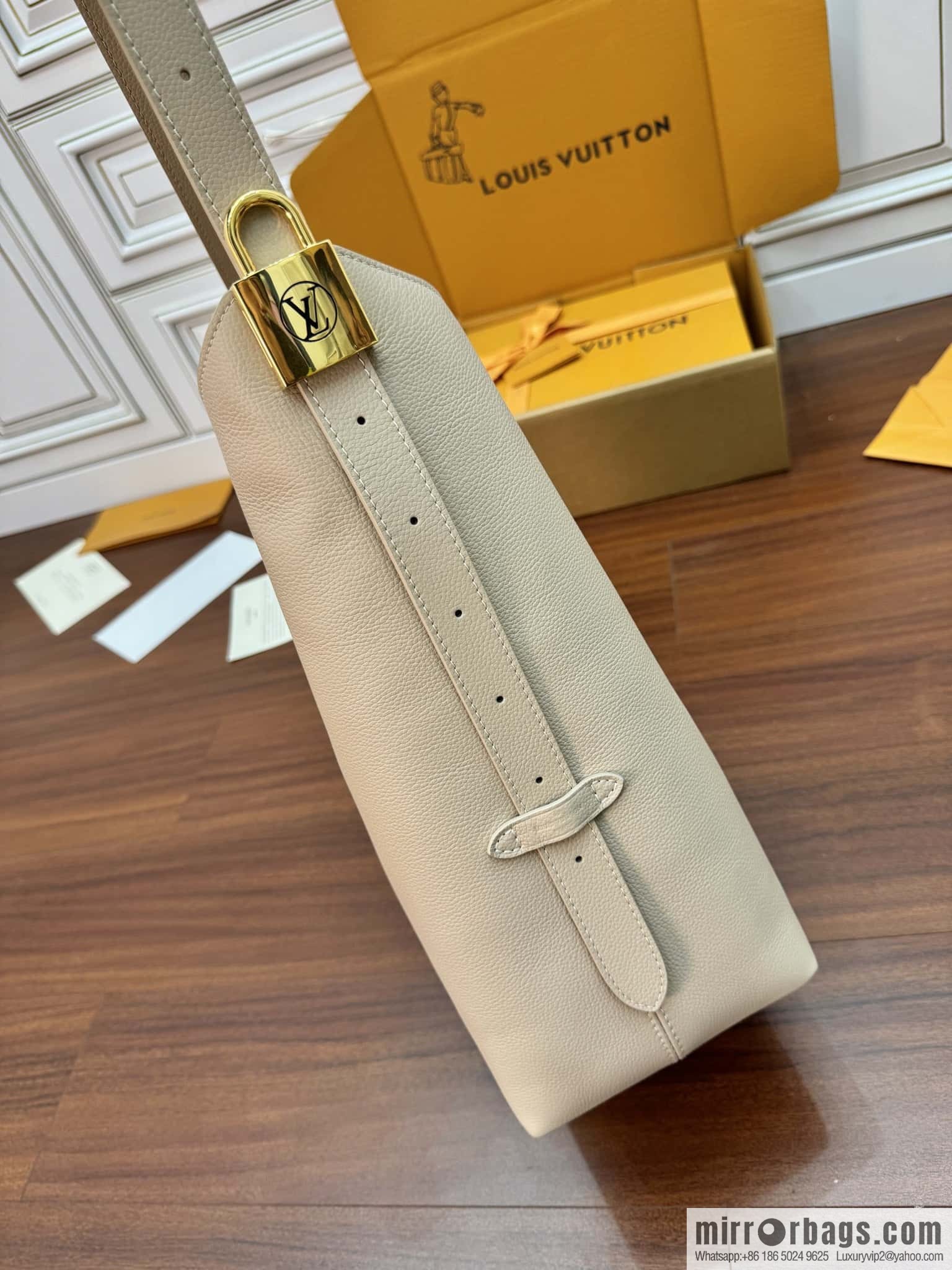 LV M25022 LOW KEY HOBO medium handbag