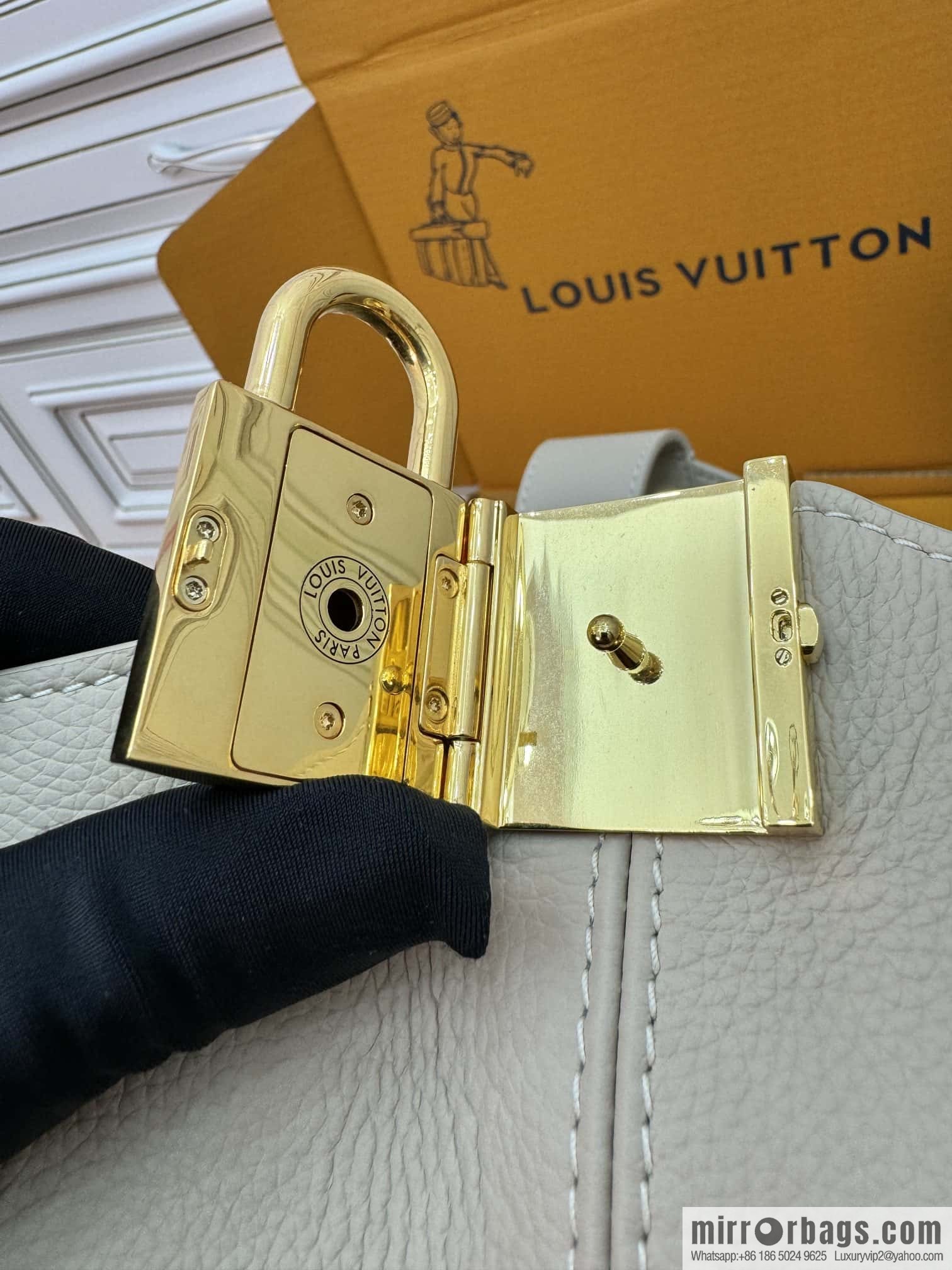 LV M25022 LOW KEY HOBO medium handbag