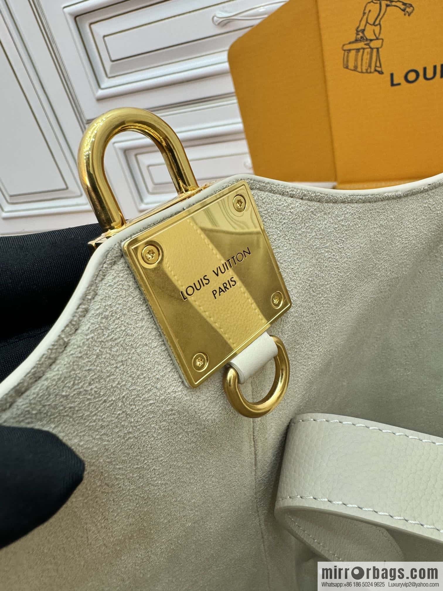 LV M25022 LOW KEY HOBO medium handbag