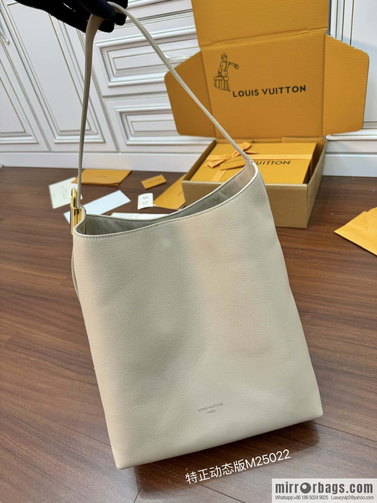 LV M25022 LOW KEY HOBO medium handbag