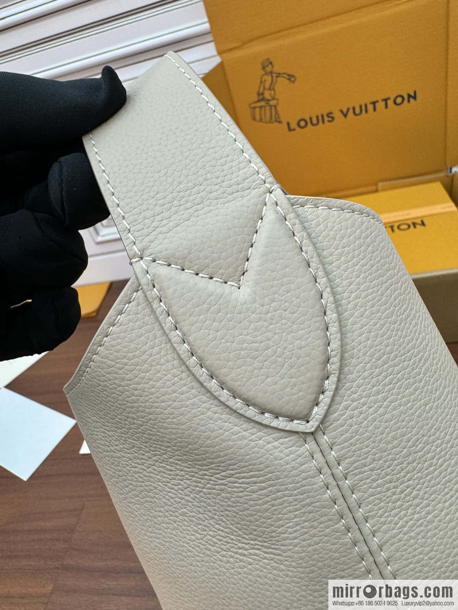 LV M25022 LOW KEY HOBO medium handbag