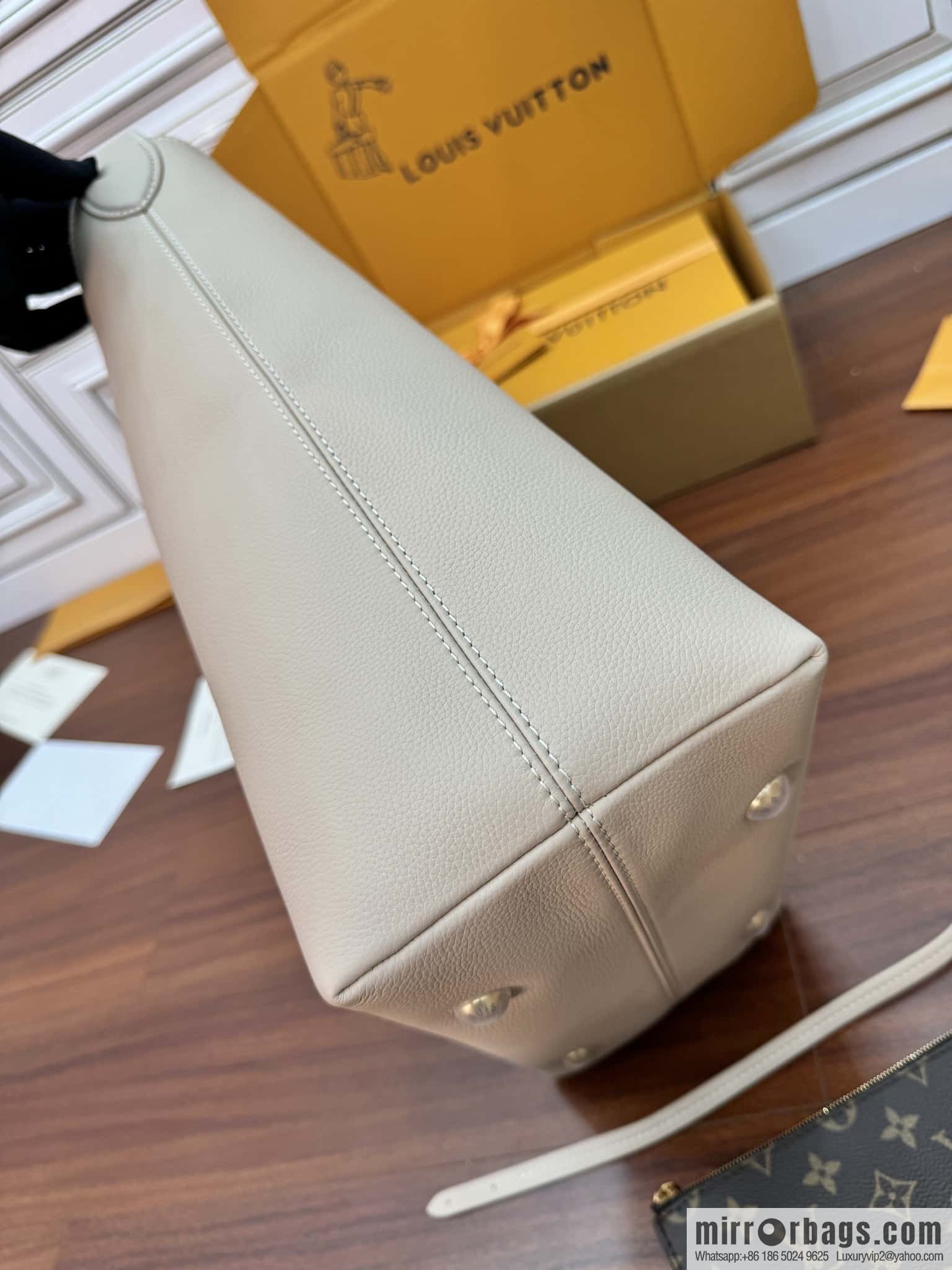 LV M25022 LOW KEY HOBO medium handbag
