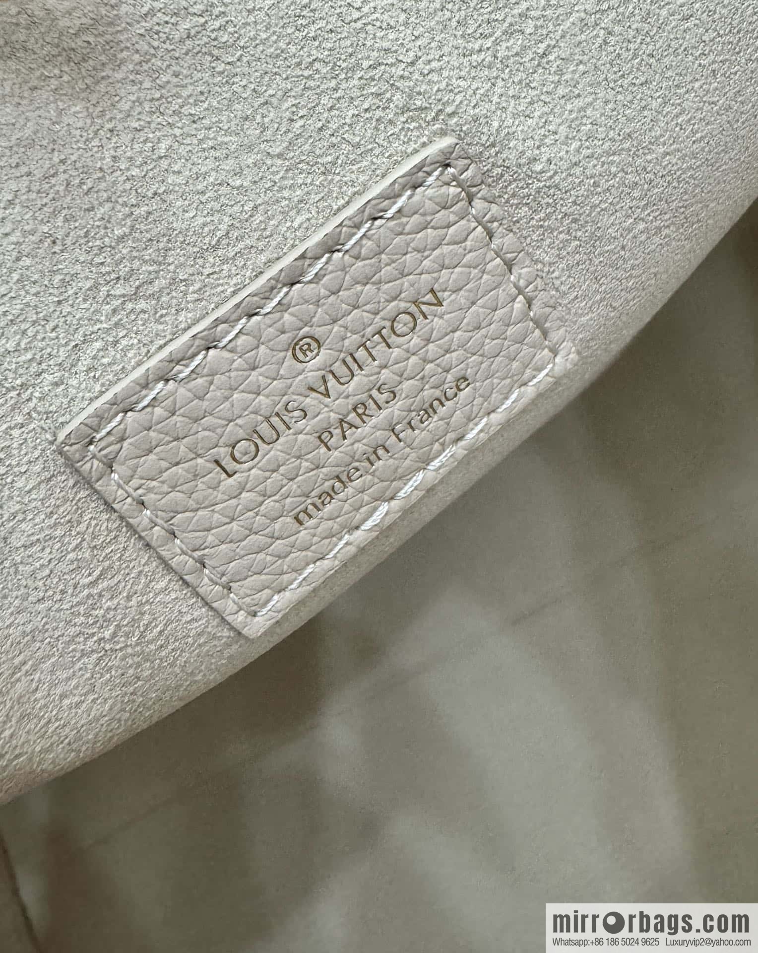 LV M25022 LOW KEY HOBO medium handbag