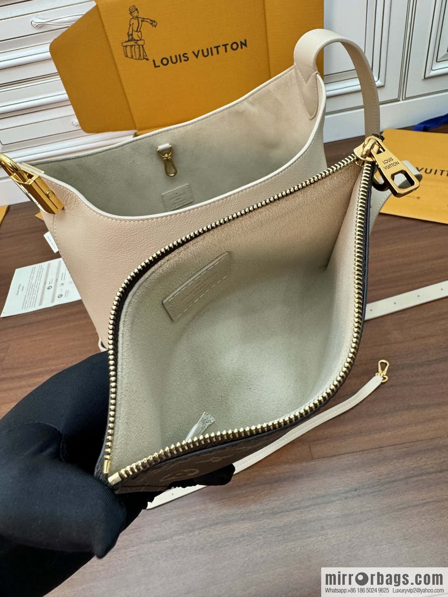 LV M25022 LOW KEY HOBO medium handbag