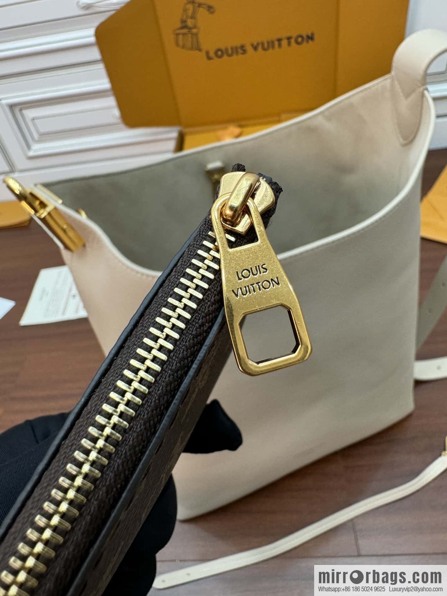 LV M25022 LOW KEY HOBO medium handbag