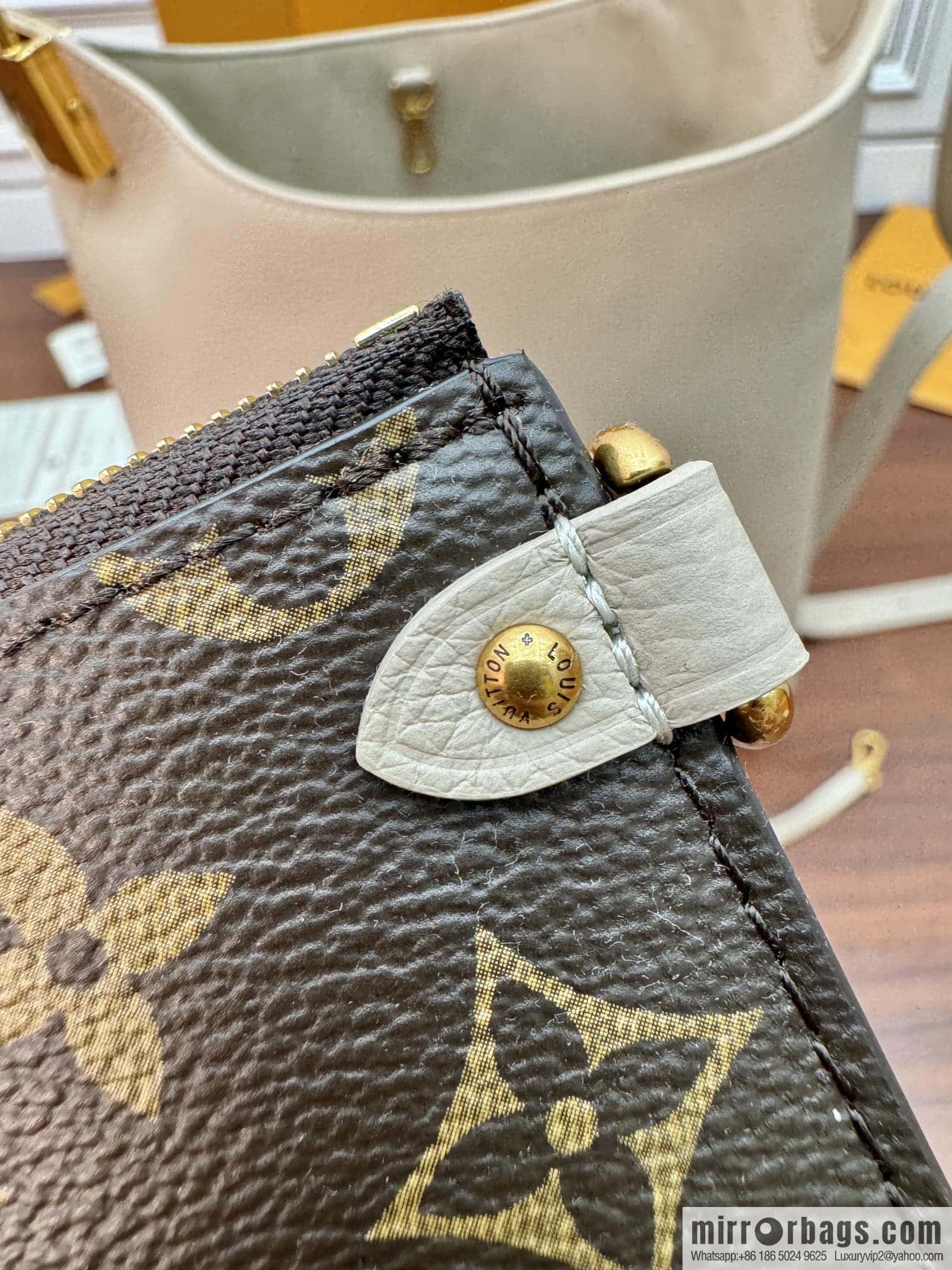LV M25022 LOW KEY HOBO medium handbag