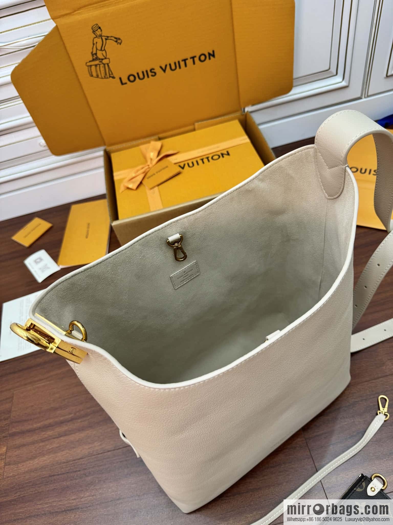 LV M25022 LOW KEY HOBO medium handbag