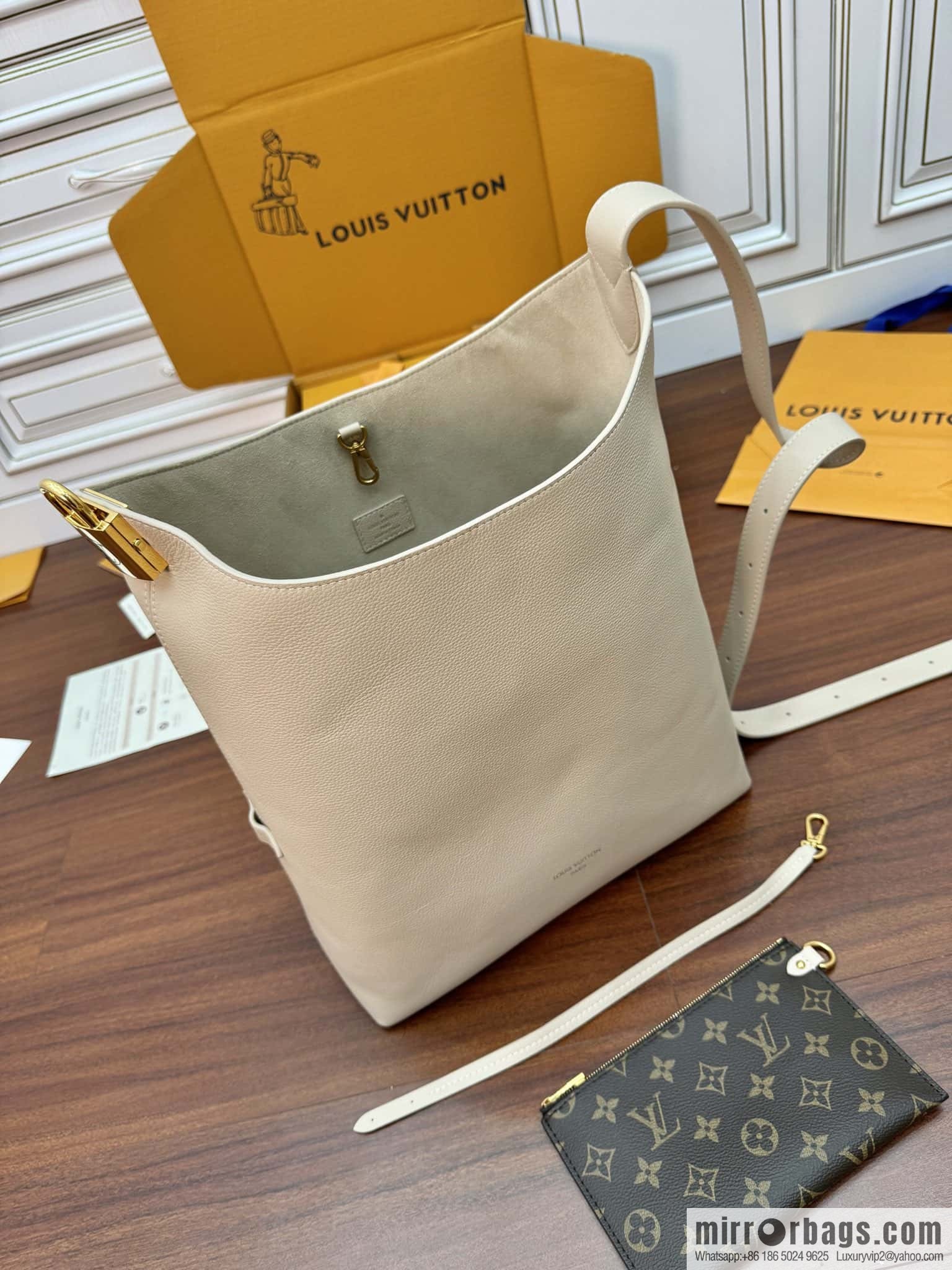 LV M25022 LOW KEY HOBO medium handbag