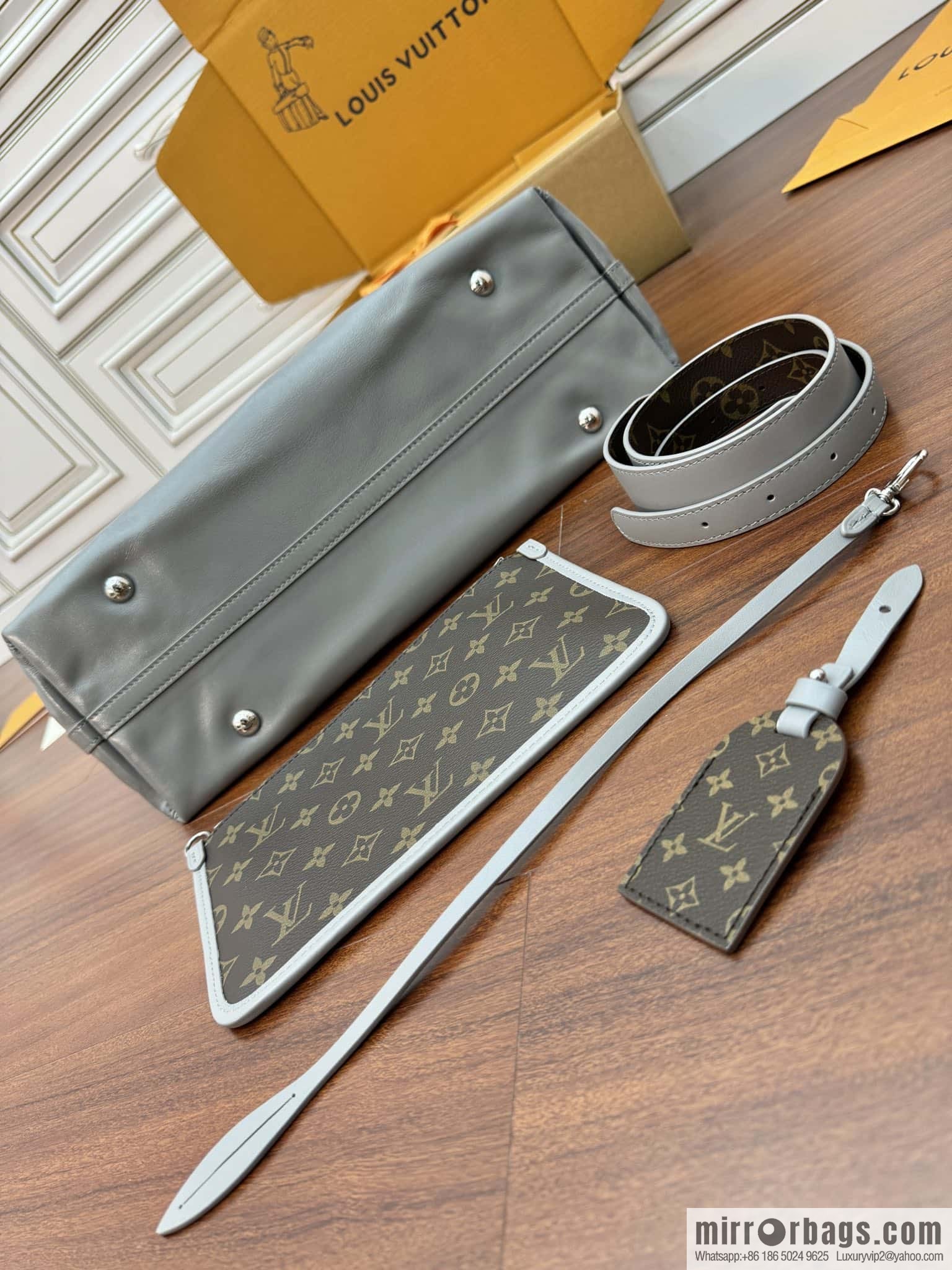 LV M12583 new CARRYALL DARK medium handbag of the season