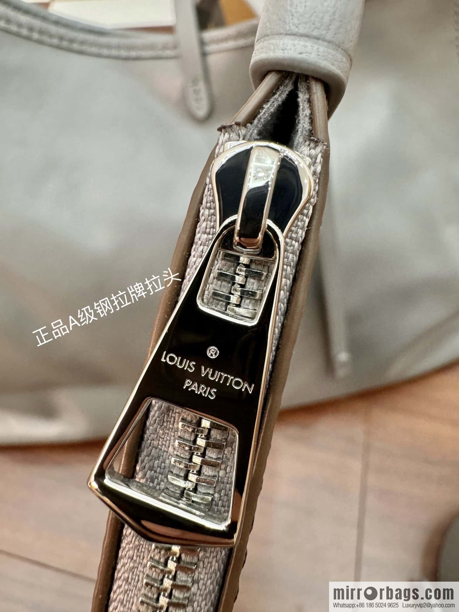 LV M12583 new CARRYALL DARK medium handbag of the season