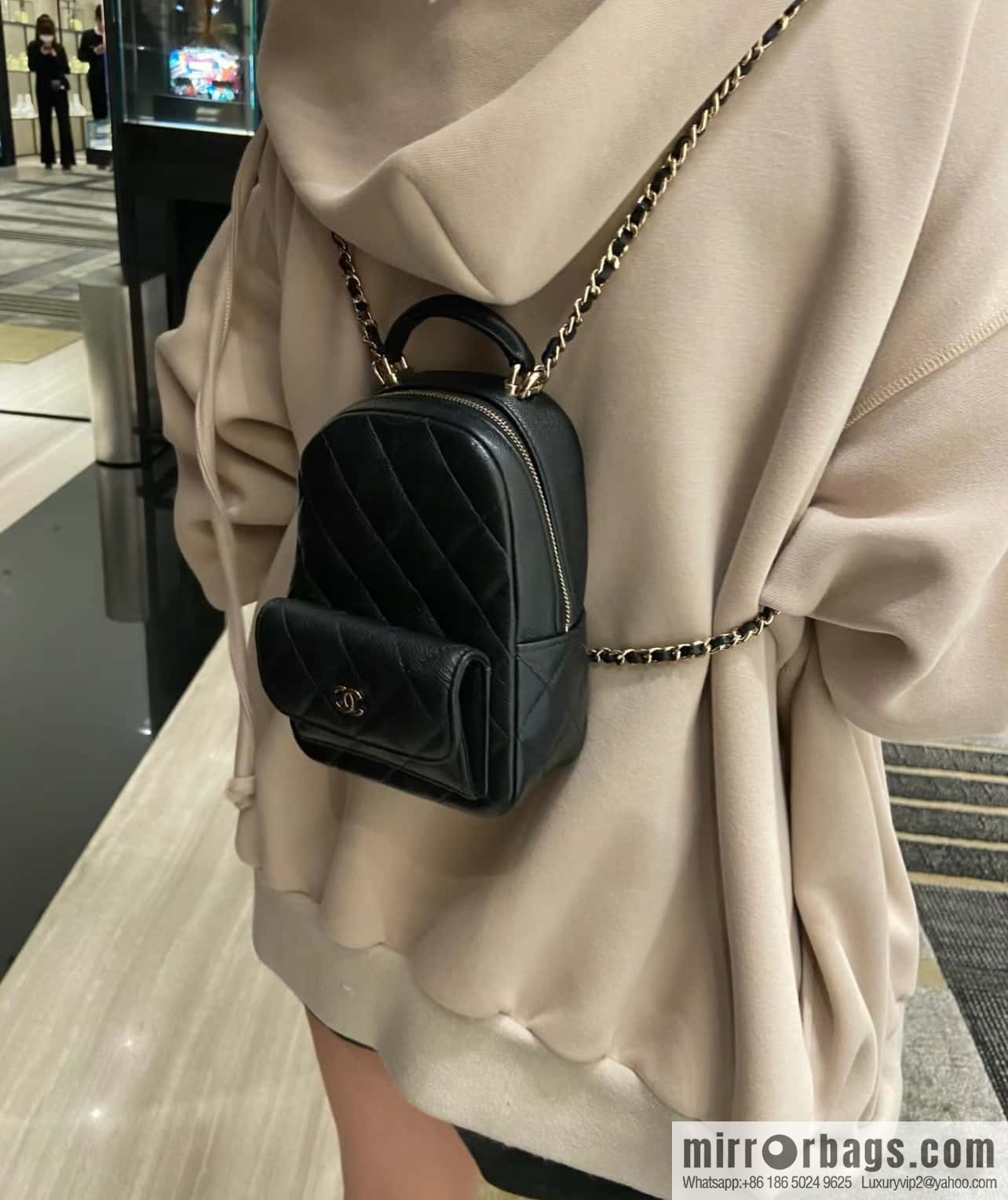 Chanel 24C mini backpack, black gold genuine leather AP3753 black