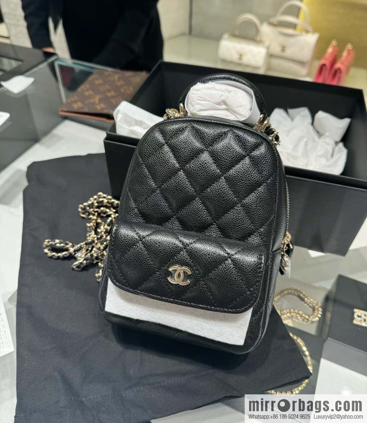 Chanel 24C mini backpack, black gold genuine leather AP3753 black