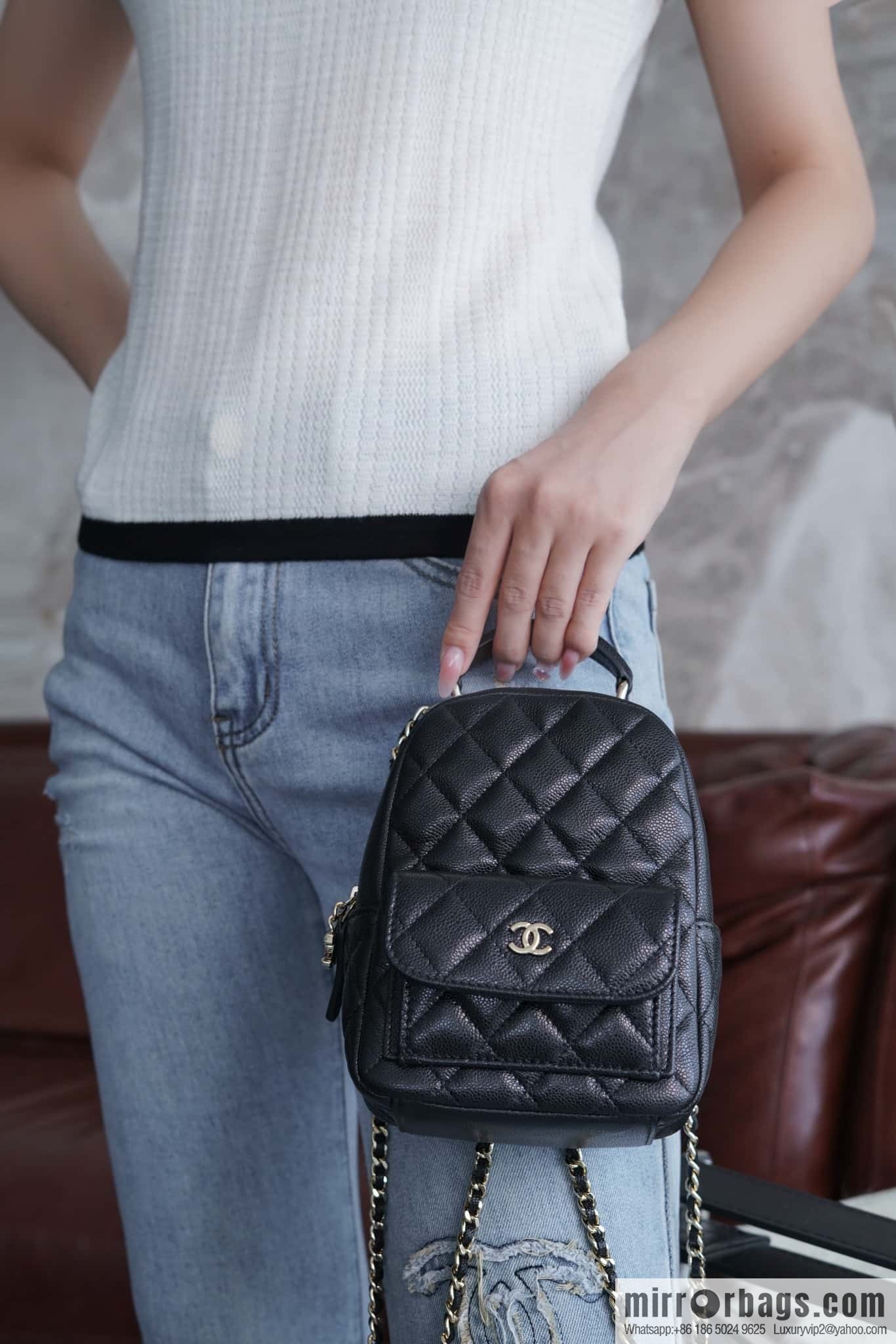 Chanel 24C mini backpack, black gold genuine leather AP3753 black