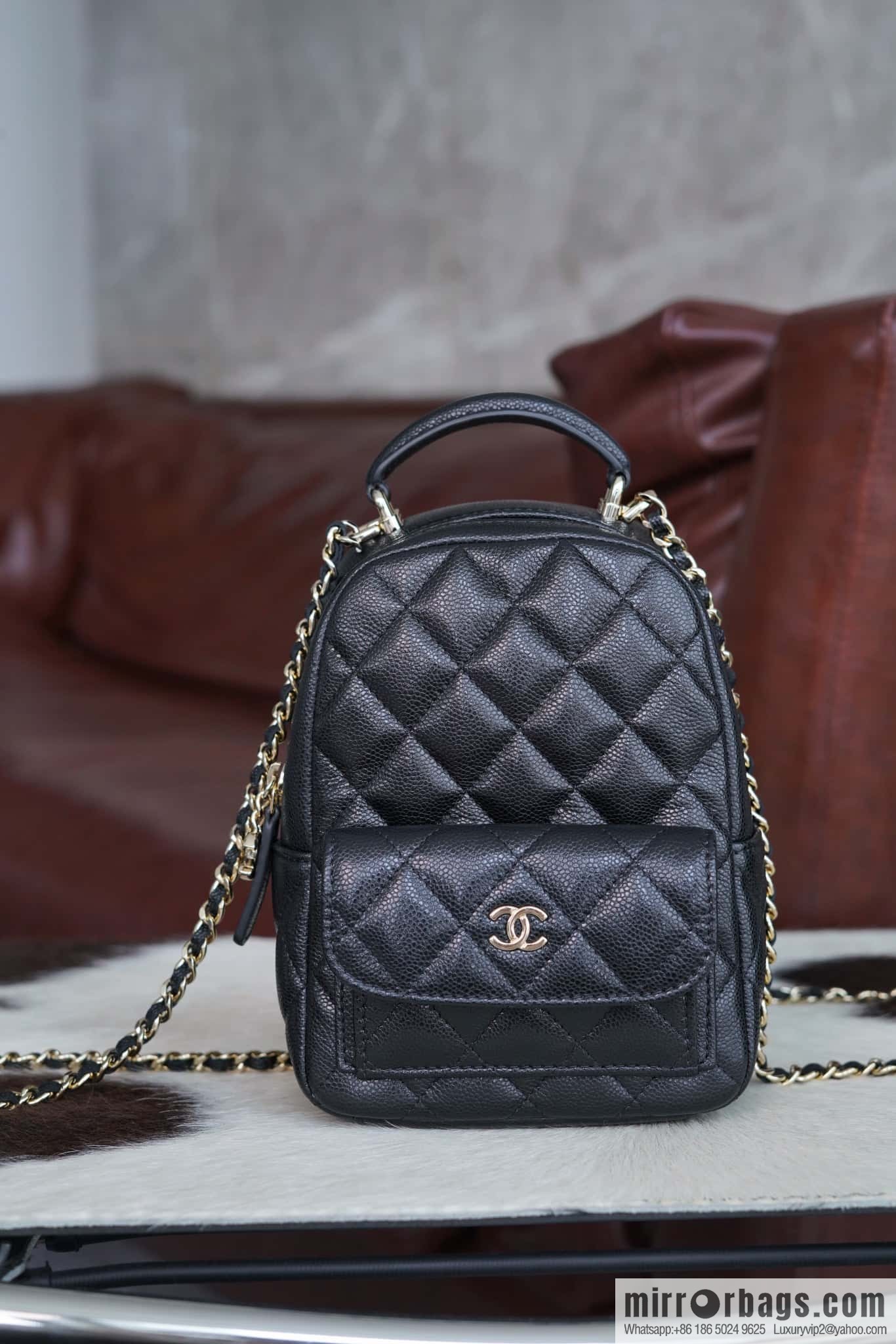 Chanel 24C mini backpack, black gold genuine leather AP3753 black