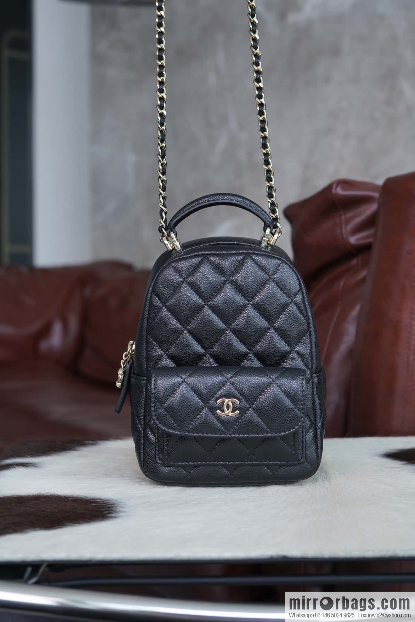 Chanel 24C mini backpack, black gold genuine leather AP3753 black