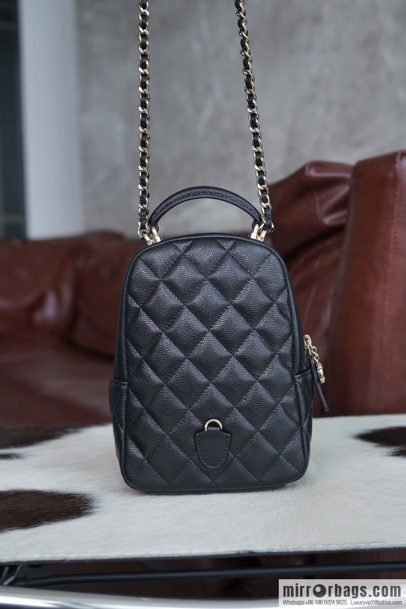 Chanel 24C mini backpack, black gold genuine leather AP3753 black