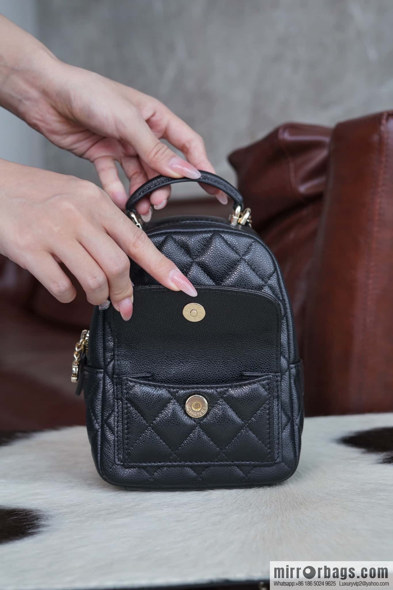 Chanel 24C mini backpack, black gold genuine leather AP3753 black