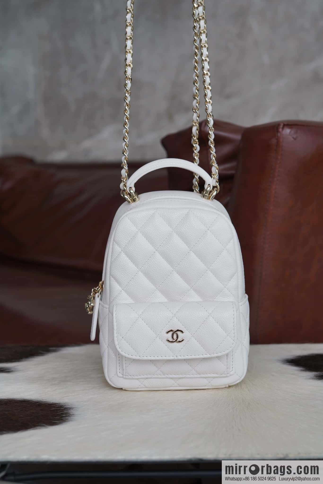 Chanel 24C mini backpack, black gold genuine leather AP3753 white