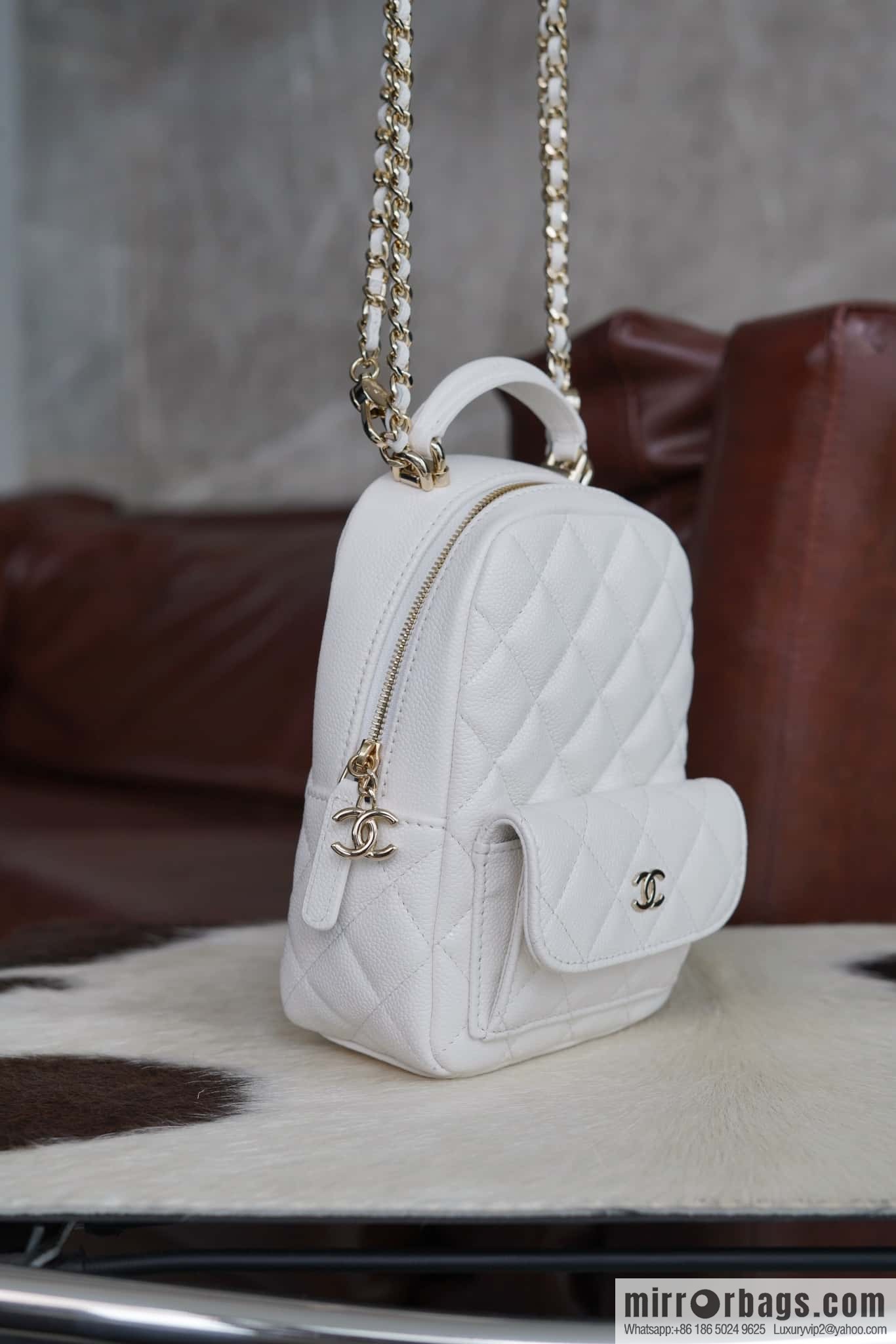 Chanel 24C mini backpack, black gold genuine leather AP3753 white