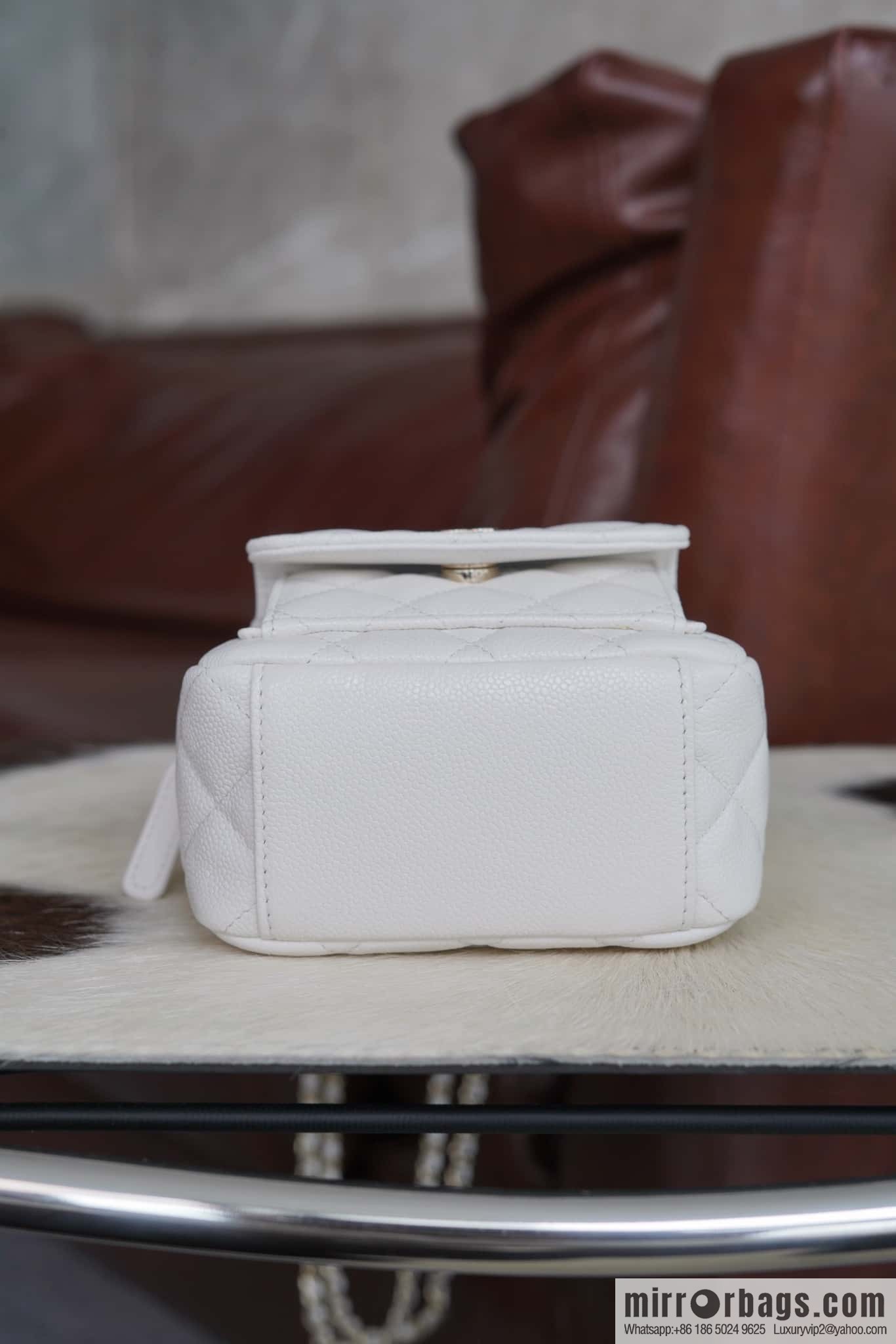 Chanel 24C mini backpack, black gold genuine leather AP3753 white