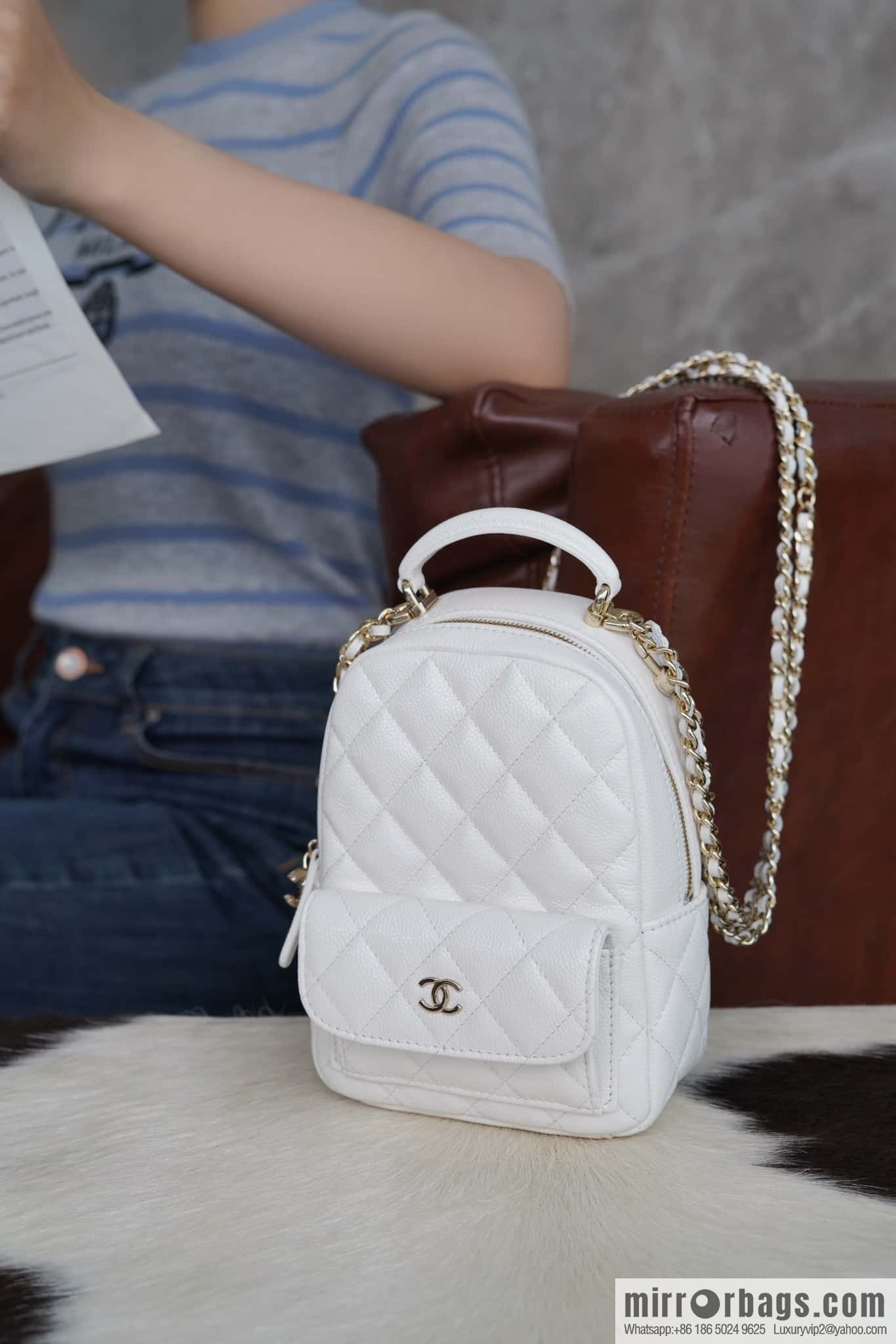 Chanel 24C mini backpack, black gold genuine leather AP3753 white