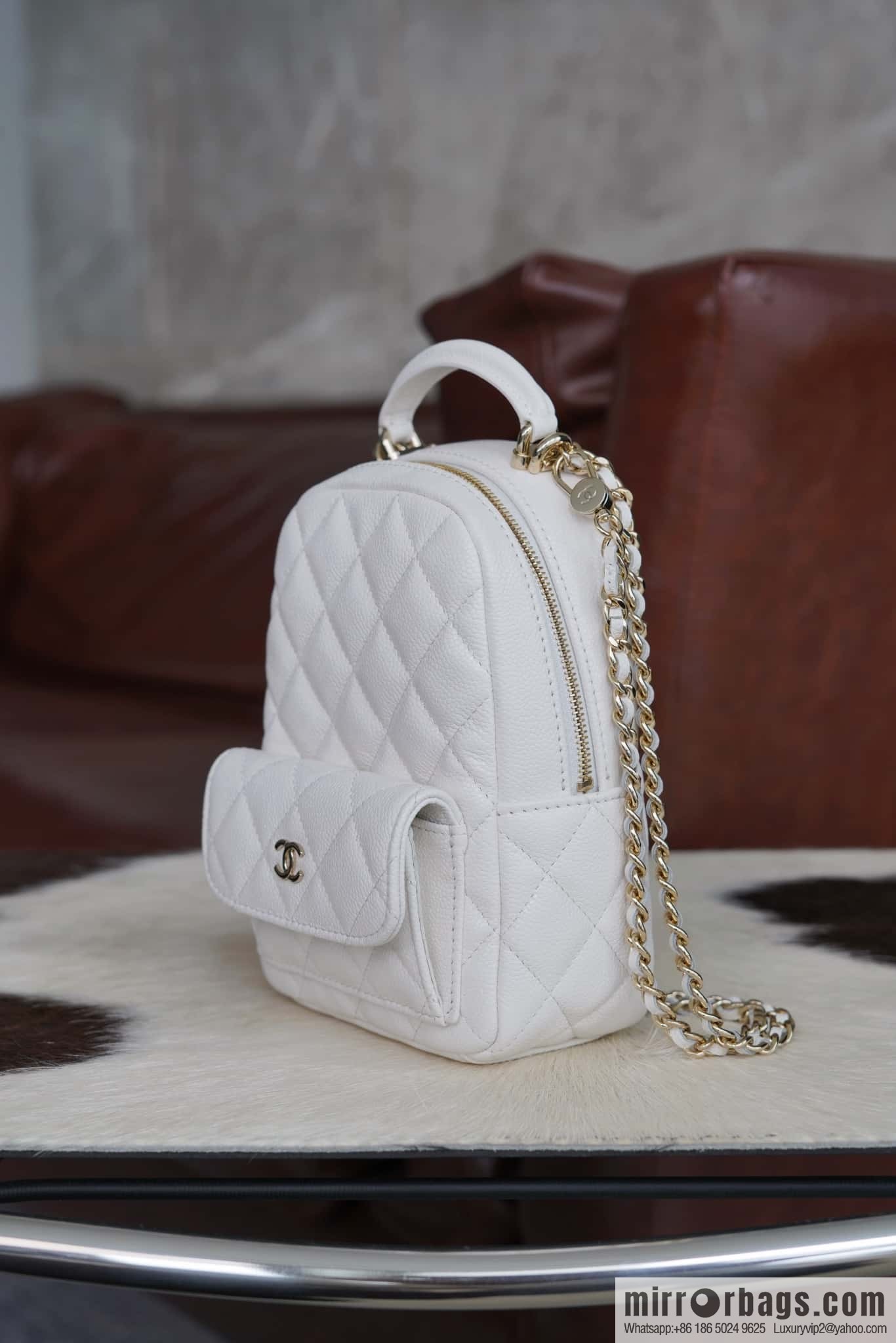Chanel 24C mini backpack, black gold genuine leather AP3753 white