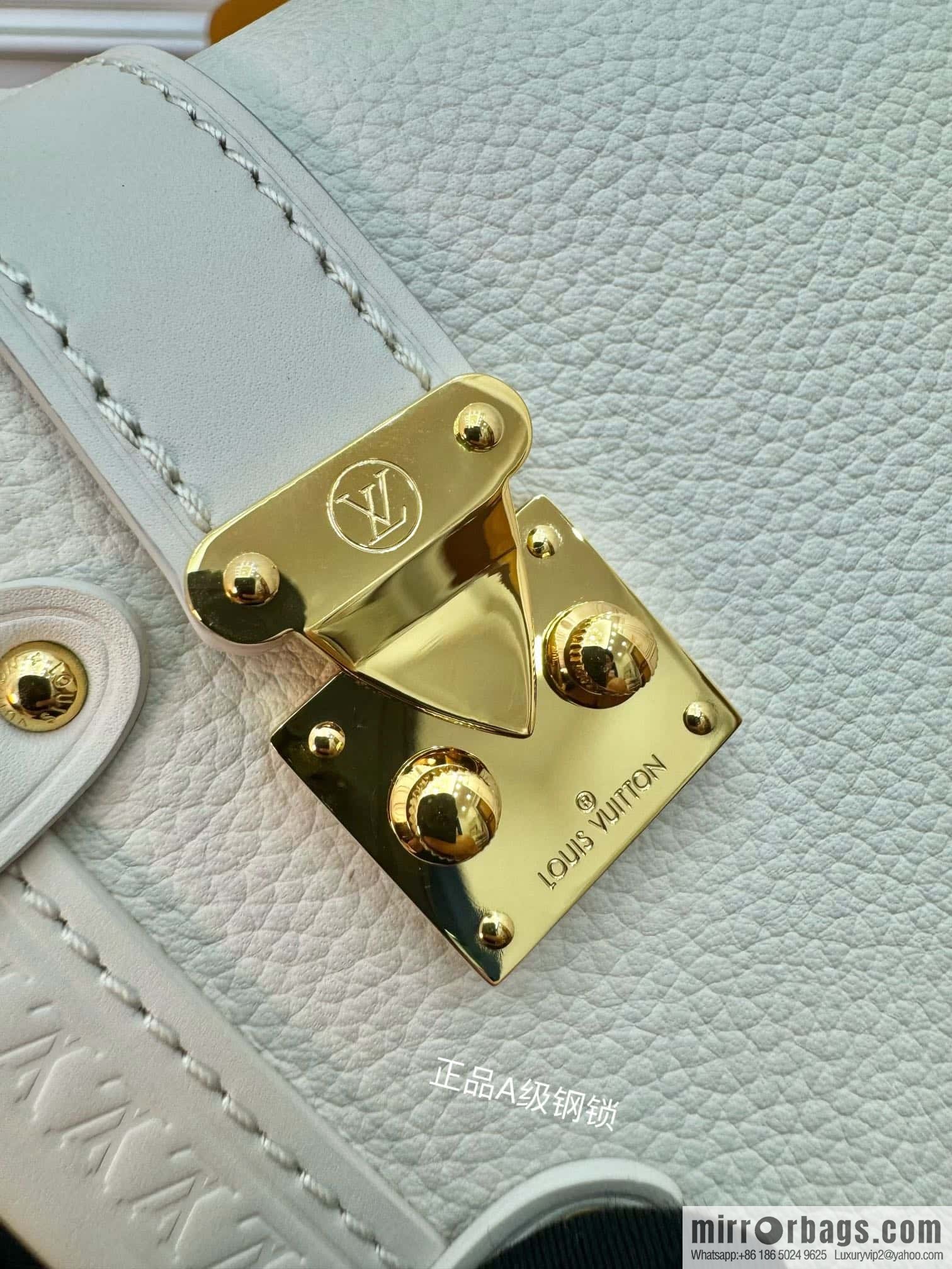 LV M23915 SIDE TRUNK small handbag