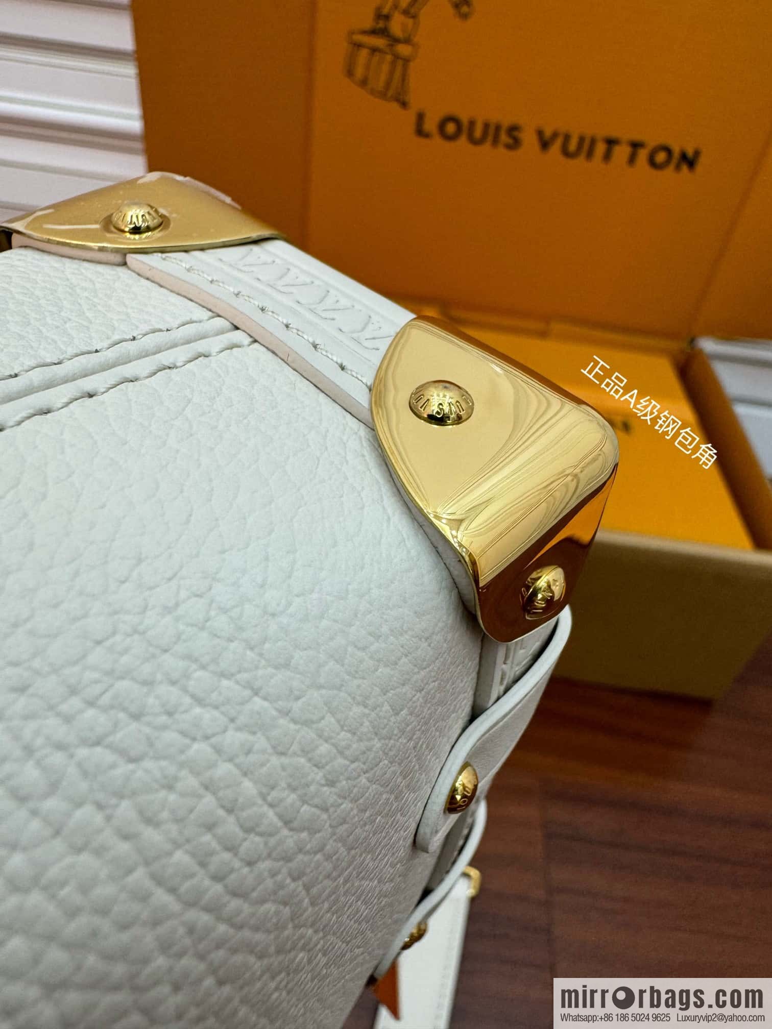 LV M23915 SIDE TRUNK small handbag