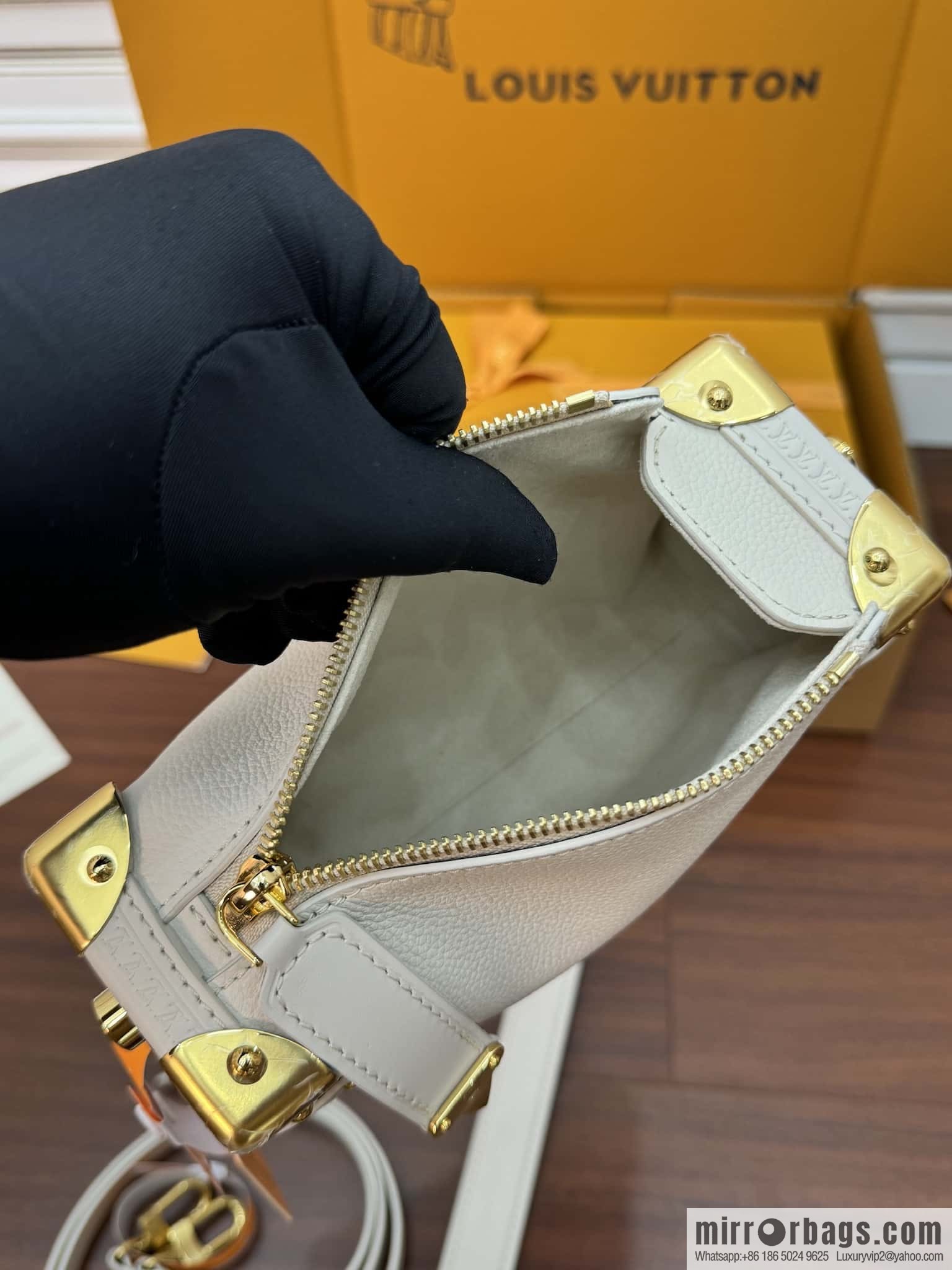 LV M23915 SIDE TRUNK small handbag