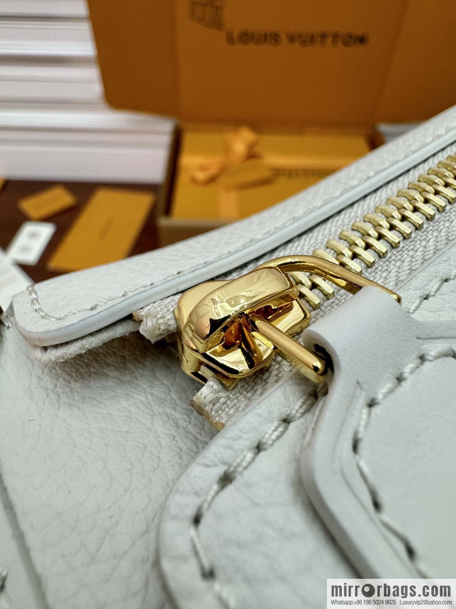 LV M23915 SIDE TRUNK small handbag