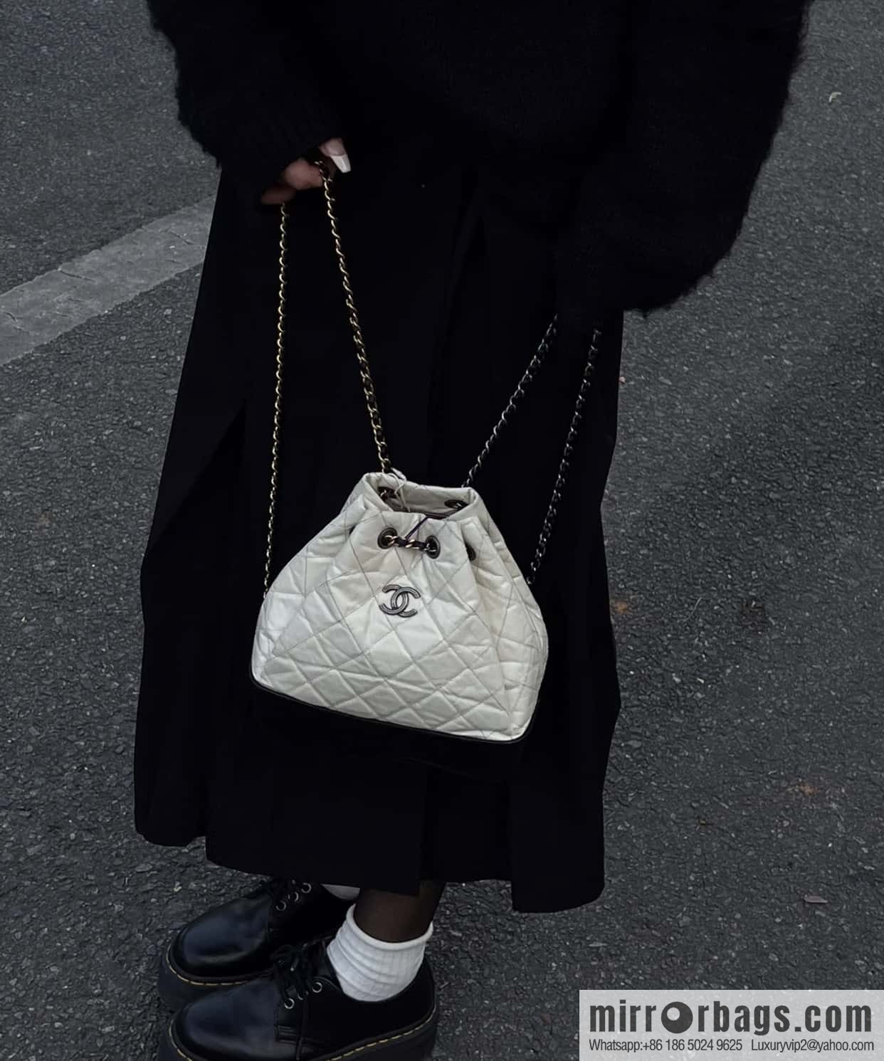 ๐๐ต๐ฎ๐ป๐ฒ๐น ๐๐ฎ๐ฏ๐ฟ๐ถ๐ฒ๐น๐น๐ฒ stray backpack, black and white ๐ A94485