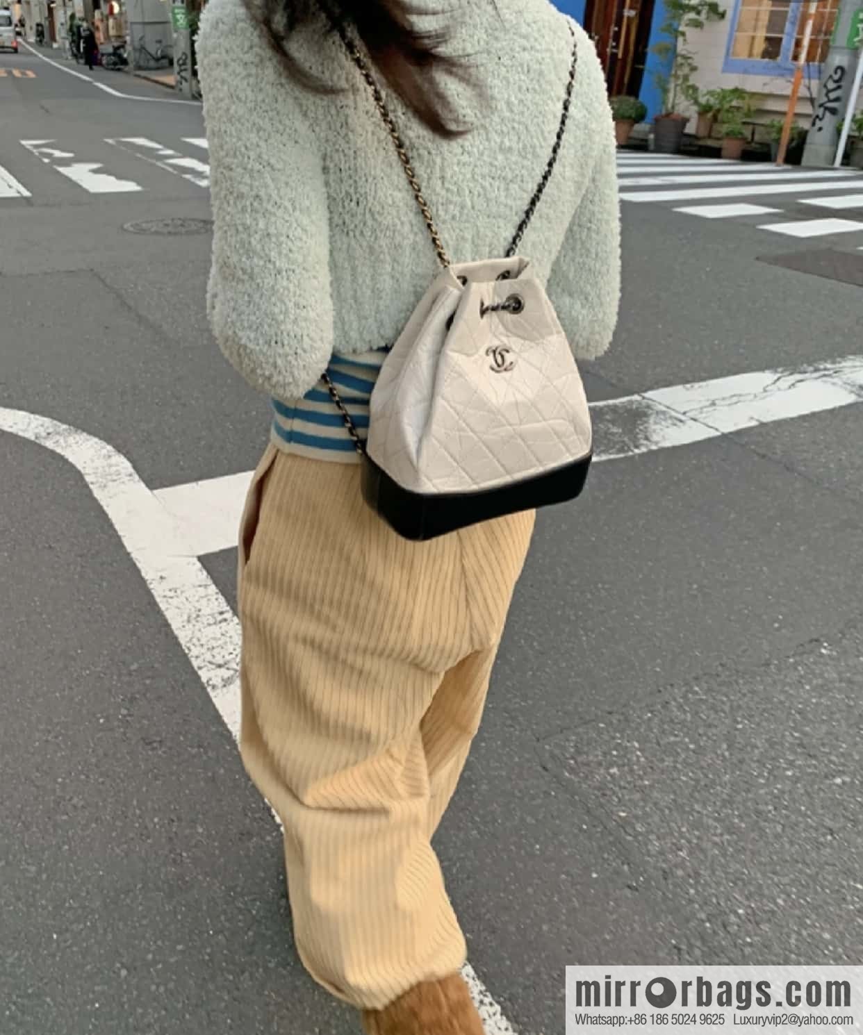 ๐๐ต๐ฎ๐ป๐ฒ๐น ๐๐ฎ๐ฏ๐ฟ๐ถ๐ฒ๐น๐น๐ฒ stray backpack, black and white ๐ A94485