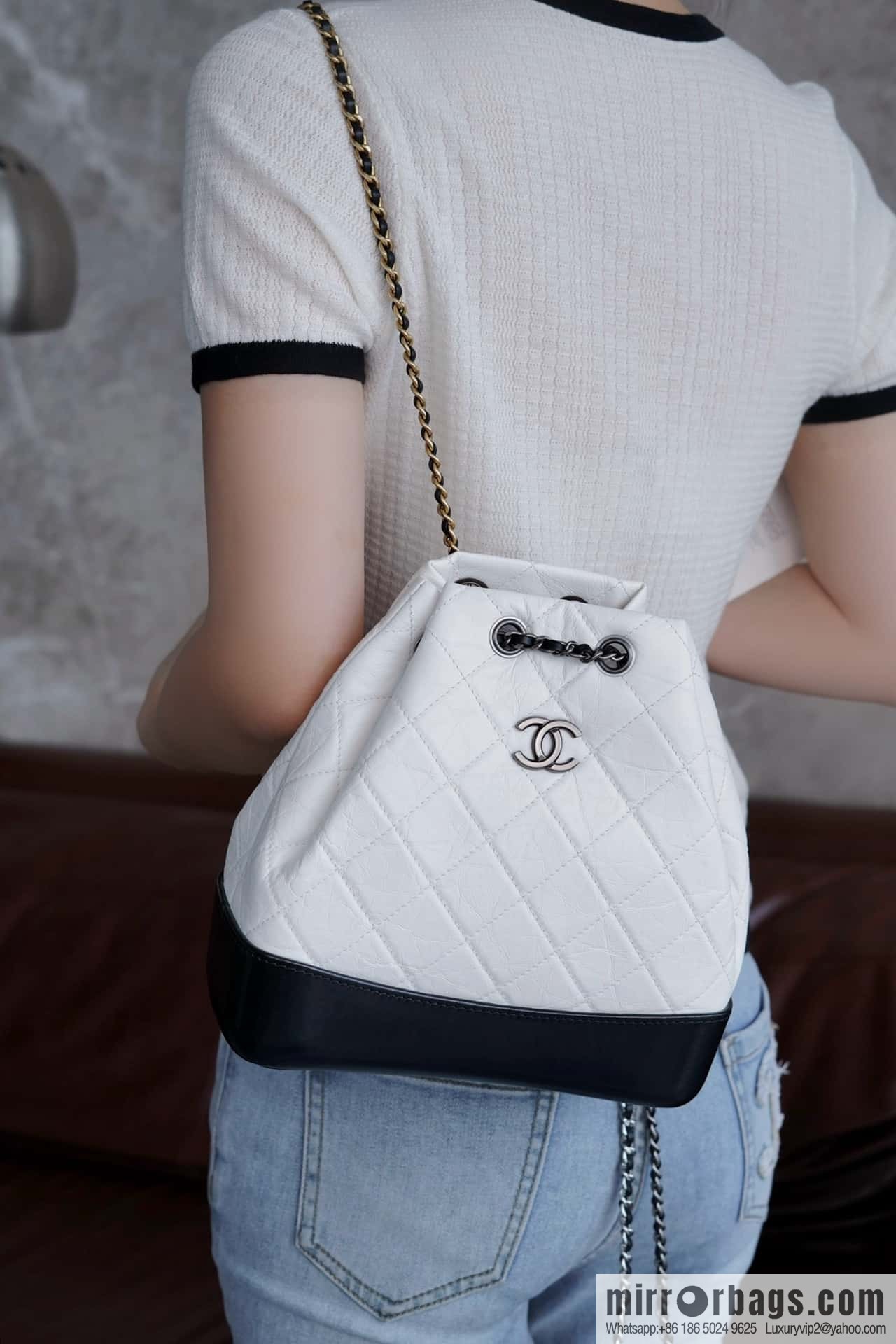 ๐๐ต๐ฎ๐ป๐ฒ๐น ๐๐ฎ๐ฏ๐ฟ๐ถ๐ฒ๐น๐น๐ฒ stray backpack, black and white ๐ A94485
