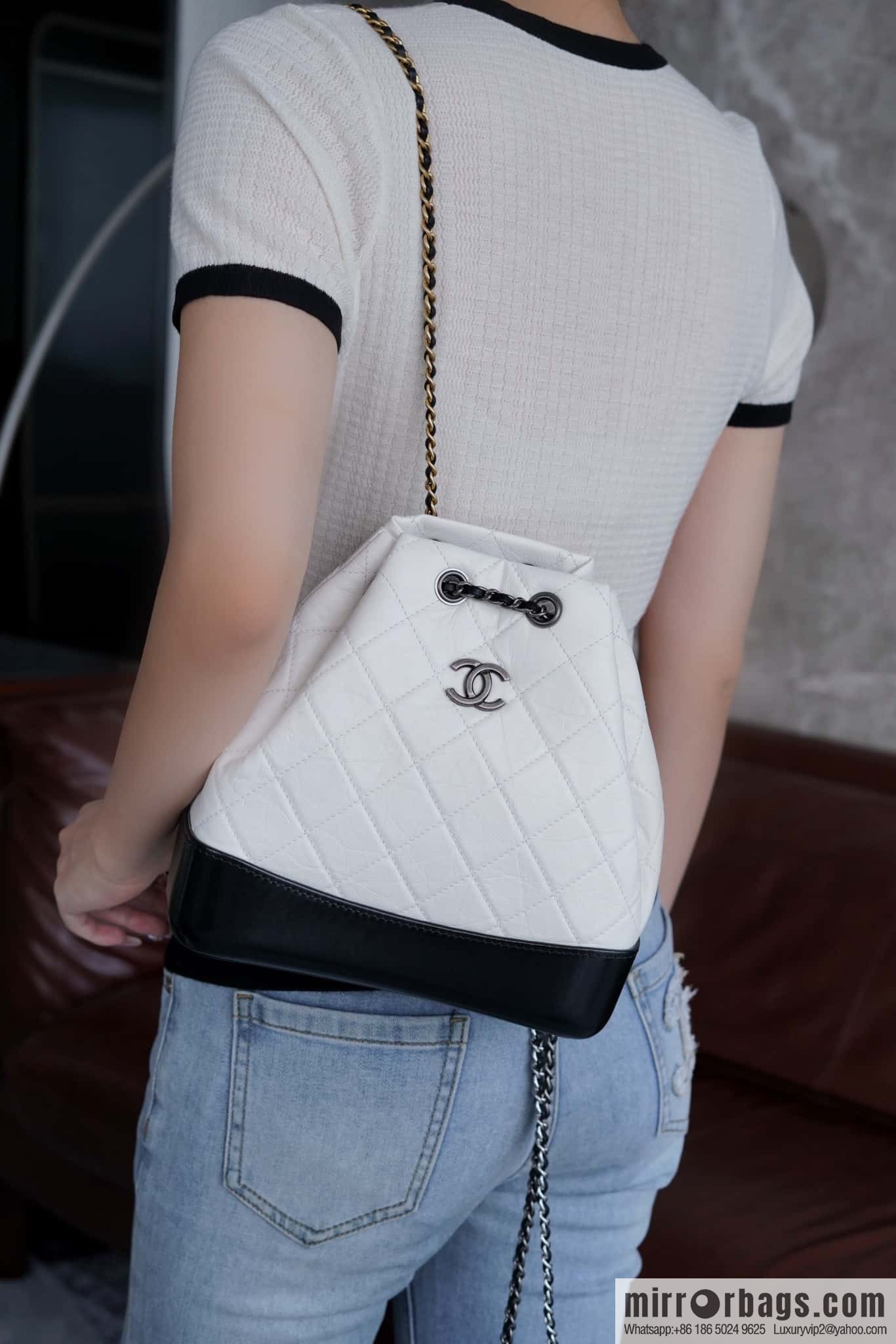 ๐๐ต๐ฎ๐ป๐ฒ๐น ๐๐ฎ๐ฏ๐ฟ๐ถ๐ฒ๐น๐น๐ฒ stray backpack, black and white ๐ A94485