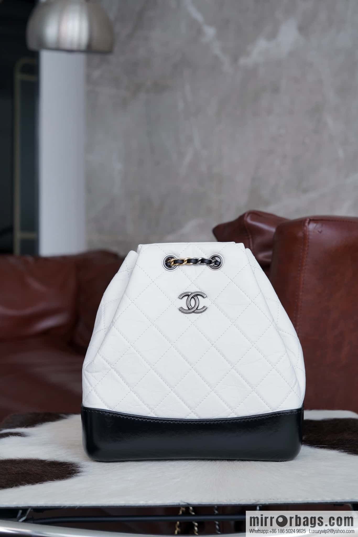 ๐๐ต๐ฎ๐ป๐ฒ๐น ๐๐ฎ๐ฏ๐ฟ๐ถ๐ฒ๐น๐น๐ฒ stray backpack, black and white ๐ A94485