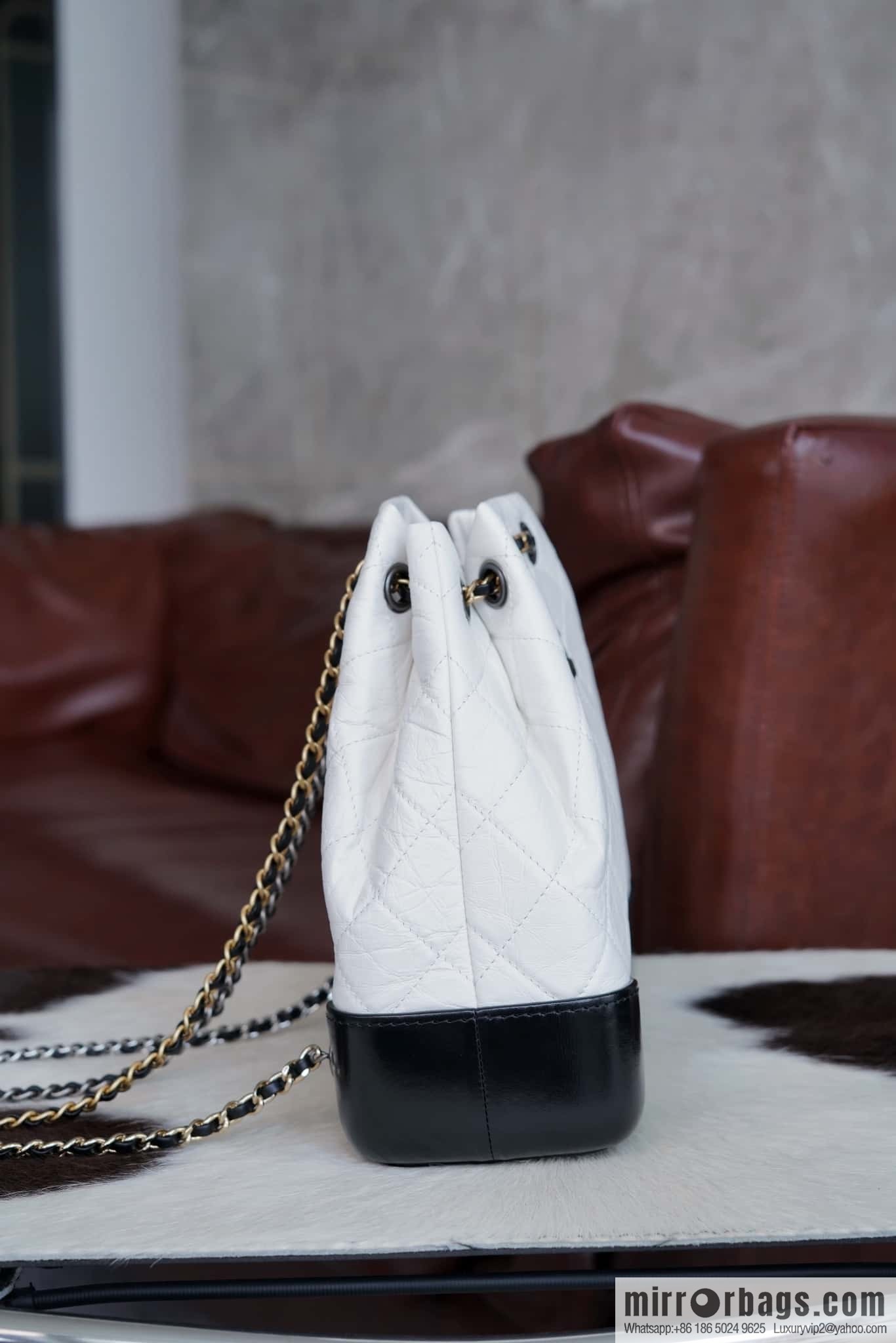 ๐๐ต๐ฎ๐ป๐ฒ๐น ๐๐ฎ๐ฏ๐ฟ๐ถ๐ฒ๐น๐น๐ฒ stray backpack, black and white ๐ A94485