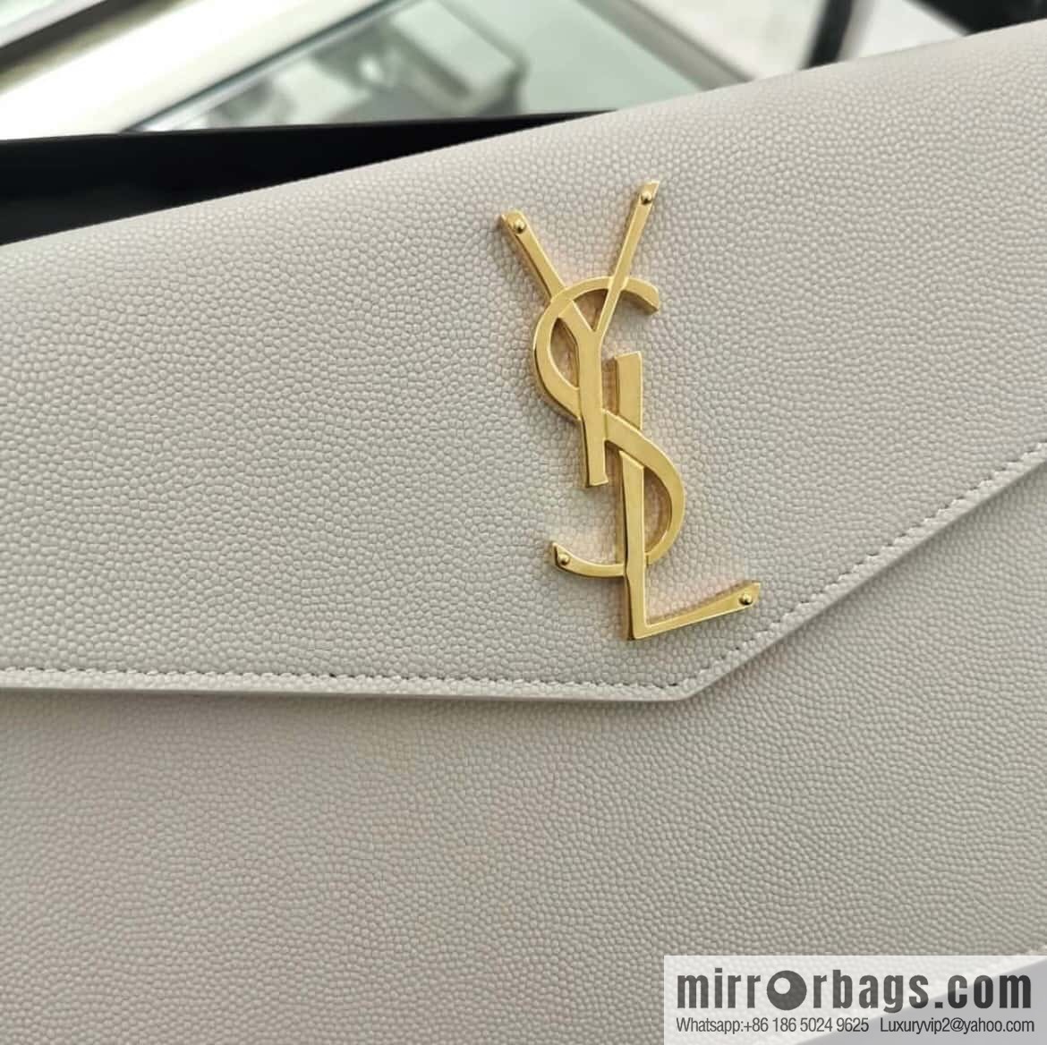 YSL 𝑼𝒑𝒕𝒐𝒘𝒏_ Caviar Clutch 565739 White