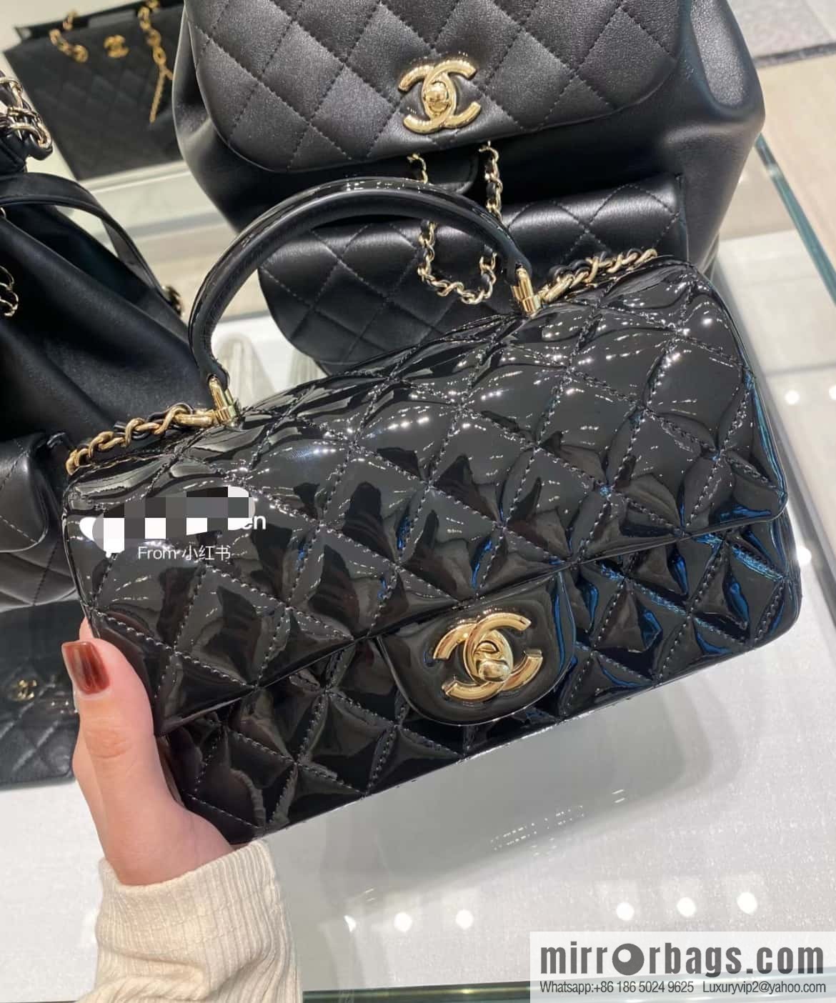𝗖𝗛𝗔𝗡𝗘𝗟 24K CF Mini Portable, patent leather, black AS2431 B18237 94305