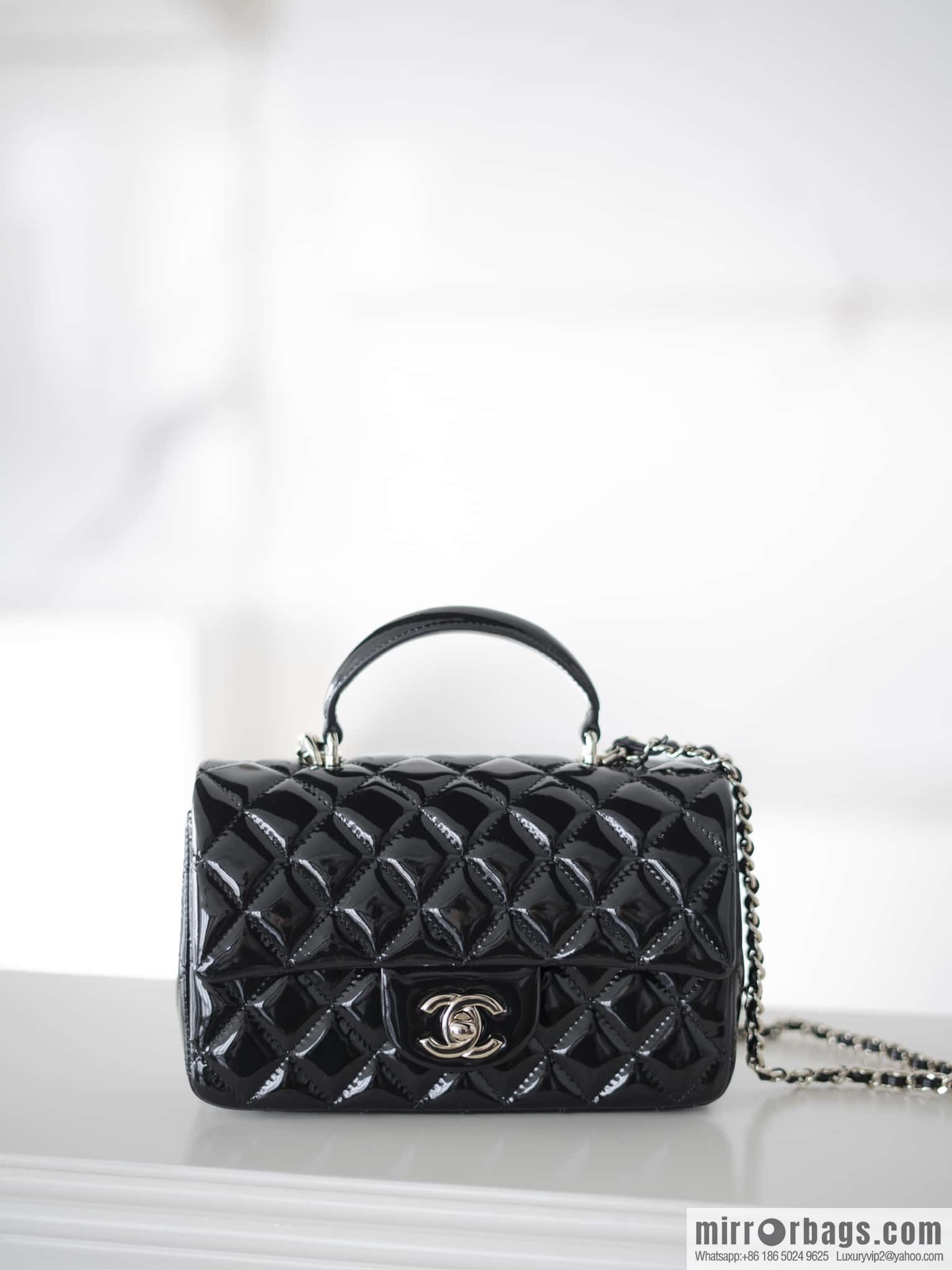 𝗖𝗛𝗔𝗡𝗘𝗟 24K CF Mini Portable, patent leather, black AS2431 B18237 94305