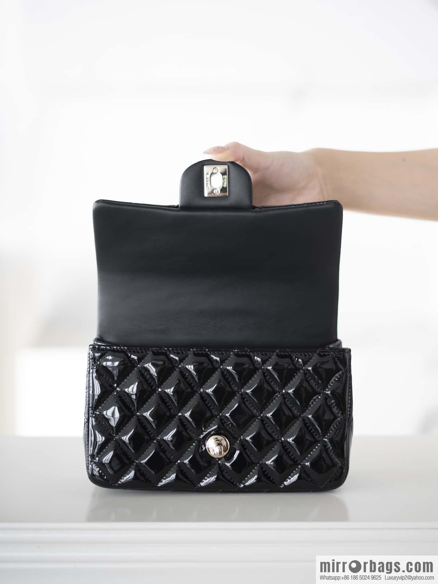 𝗖𝗛𝗔𝗡𝗘𝗟 24K CF Mini Portable, patent leather, black AS2431 B18237 94305