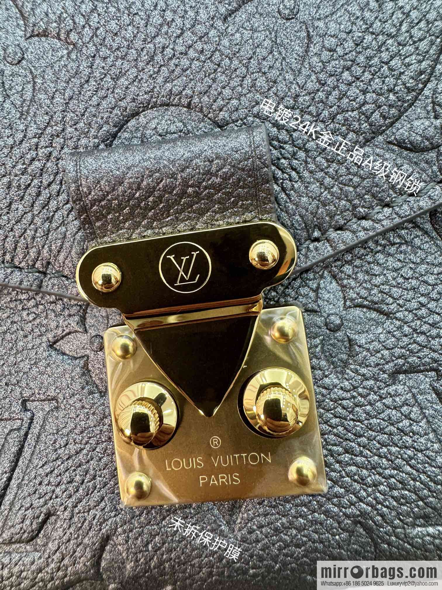 LV M11998 Pochette Métis East West