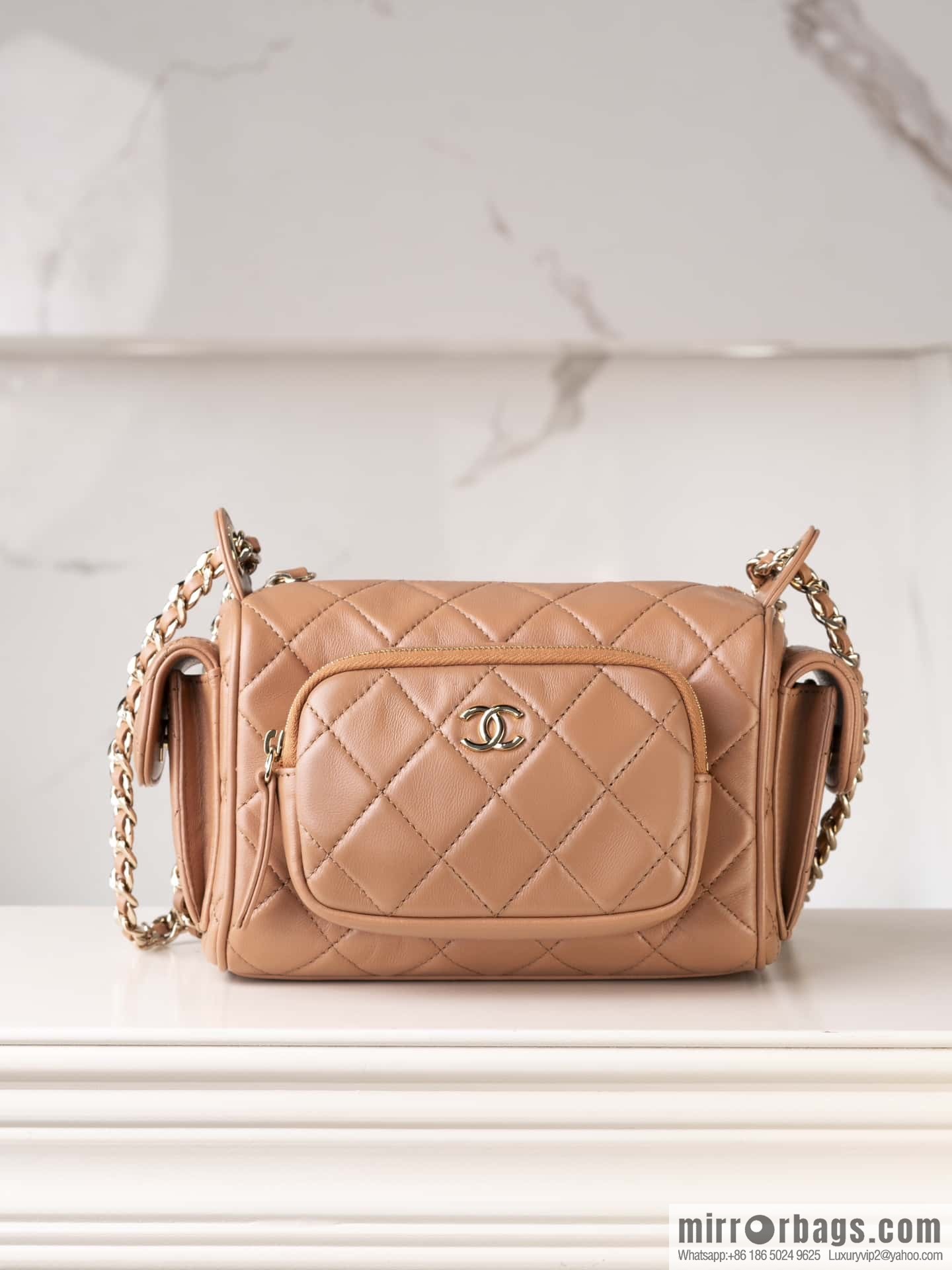 𝐂𝐇𝐀𝐍𝐄𝐋 24K multi-pocket camera bag, caramel color, small AS5220