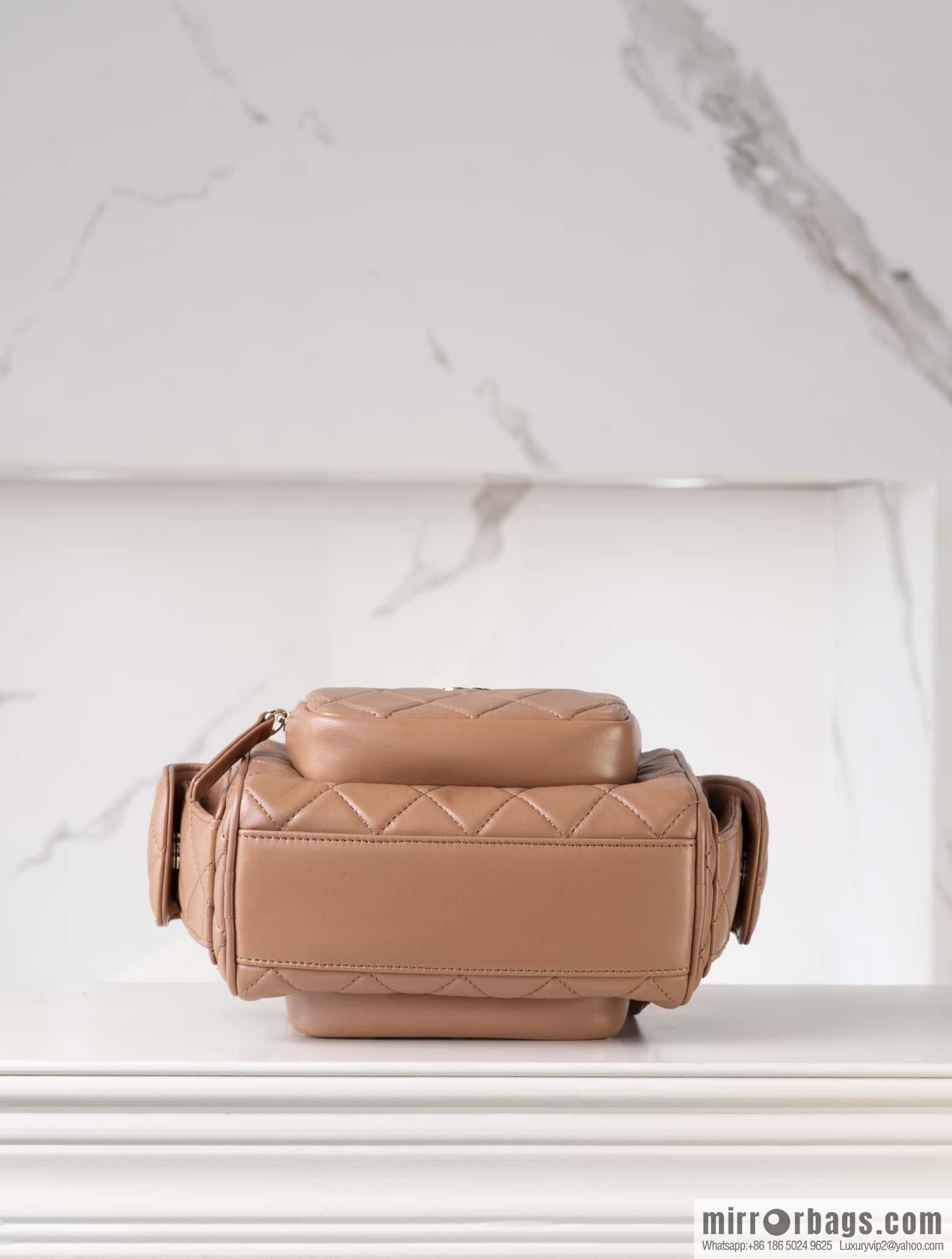 𝐂𝐇𝐀𝐍𝐄𝐋 24K multi-pocket camera bag, caramel color, small AS5220
