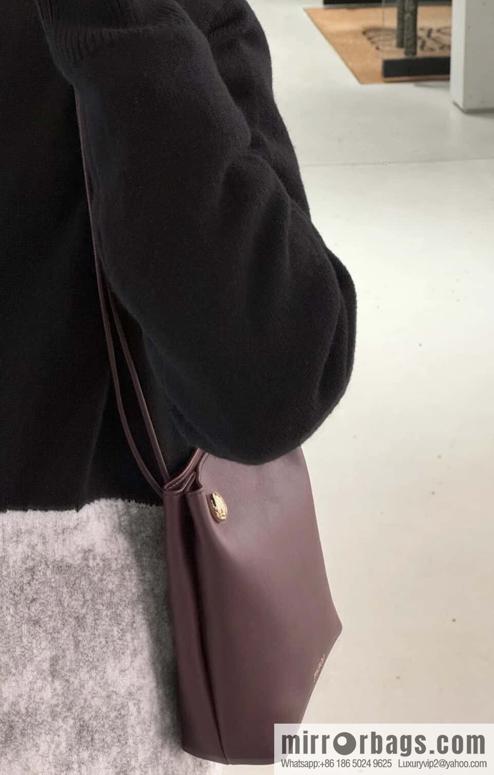 LOEWE's new Pebble Pouch 0905 burgundy
