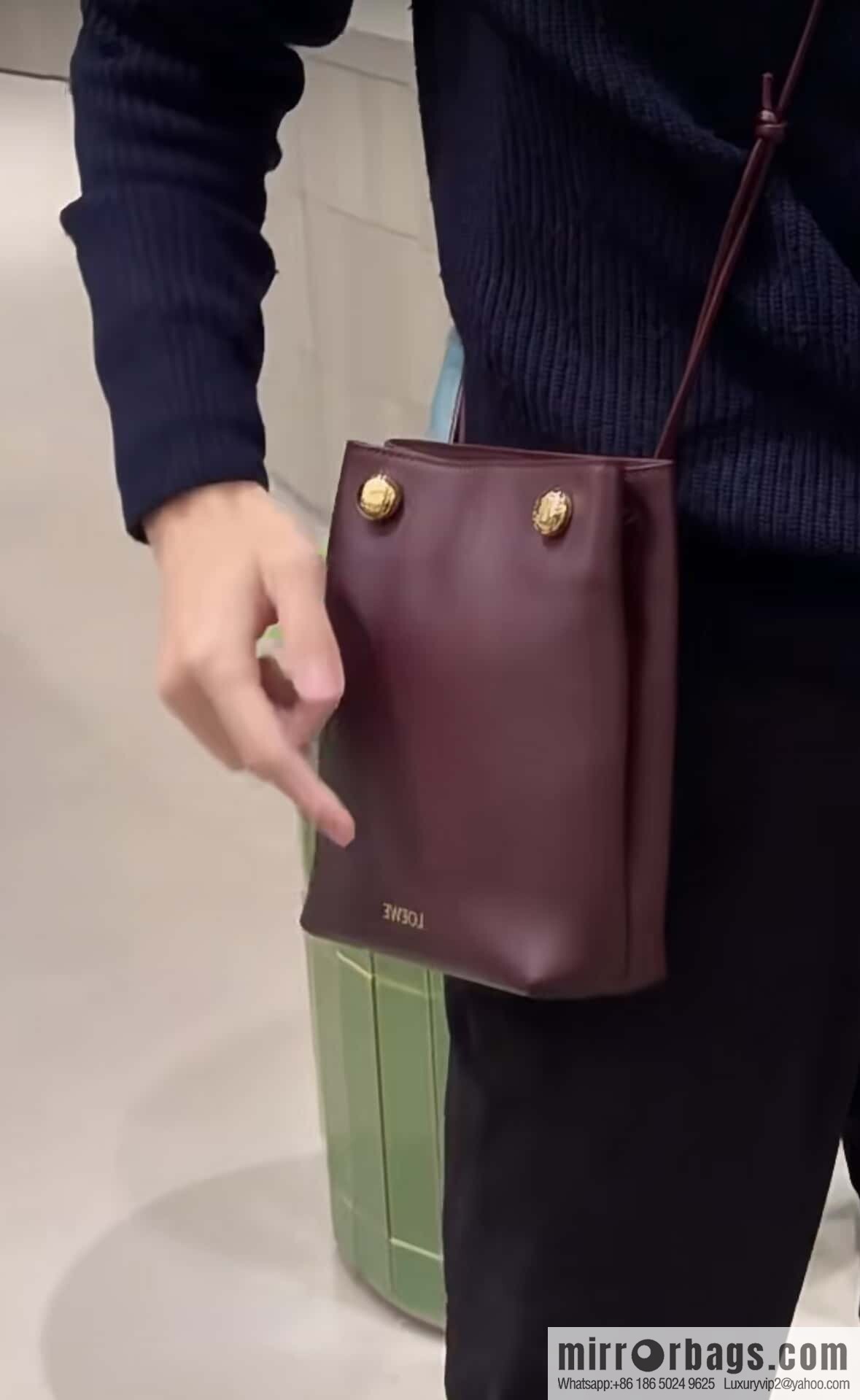 LOEWE's new Pebble Pouch 0905 burgundy