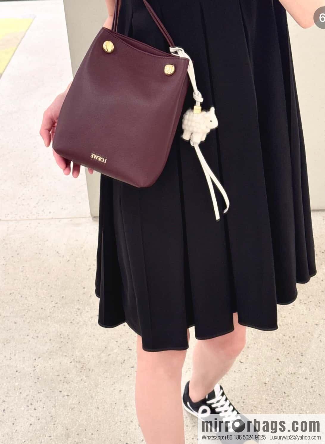 LOEWE's new Pebble Pouch 0905 burgundy