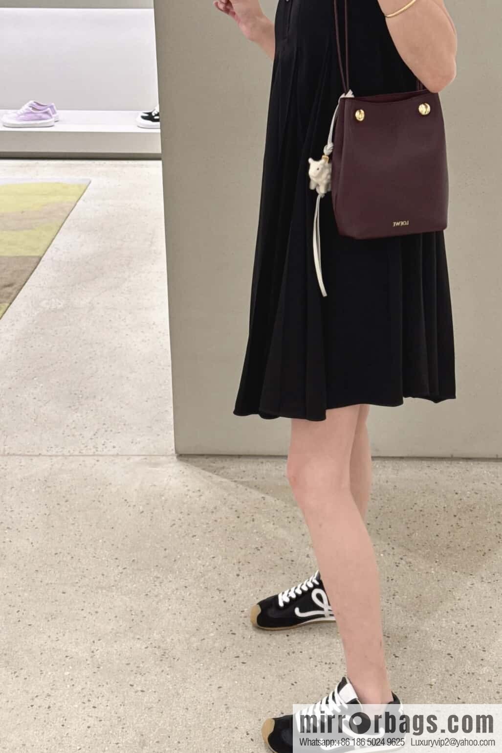 LOEWE's new Pebble Pouch 0905 burgundy