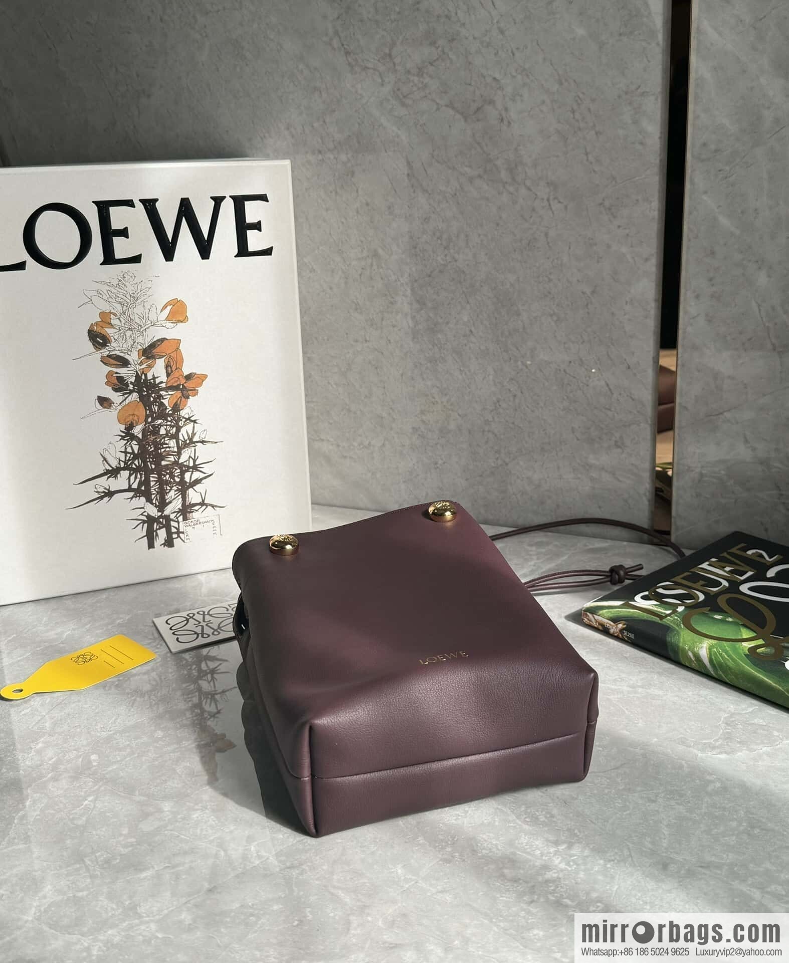 LOEWE's new Pebble Pouch 0905 burgundy